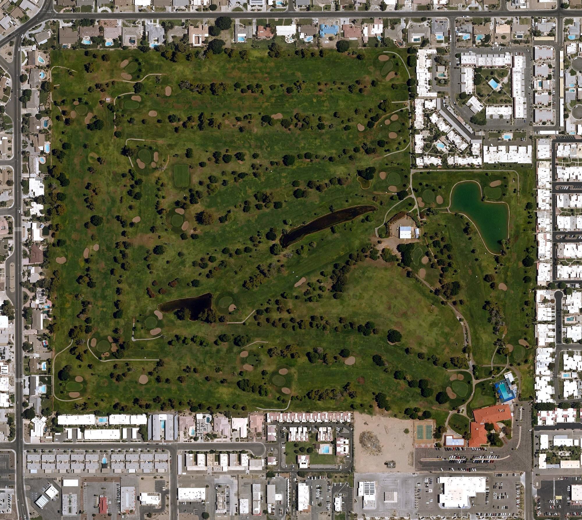 Aerial view of Yuma Golf and Country Club, AZ, with its hole routing marked