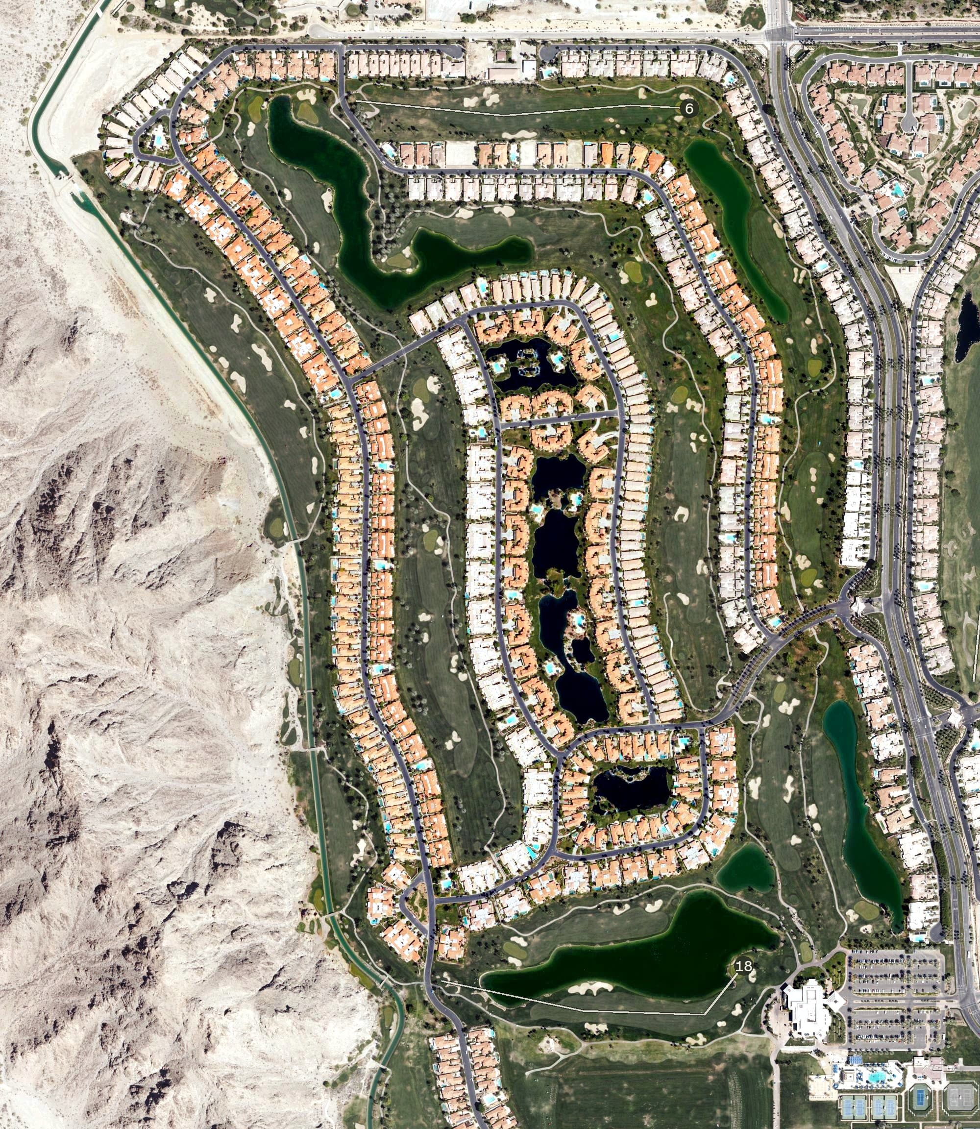 Aerial view of Arnold Palmer Golf Course (PGA West), CA, with its hole routing marked