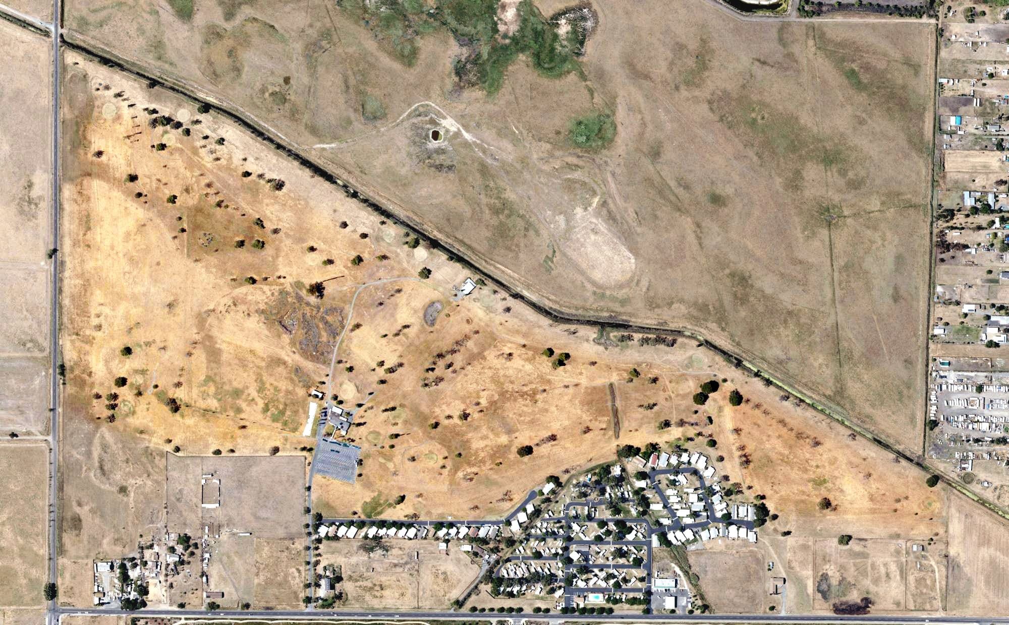 Aerial view of Bethel Island Golf Course, CA, with its hole routing marked