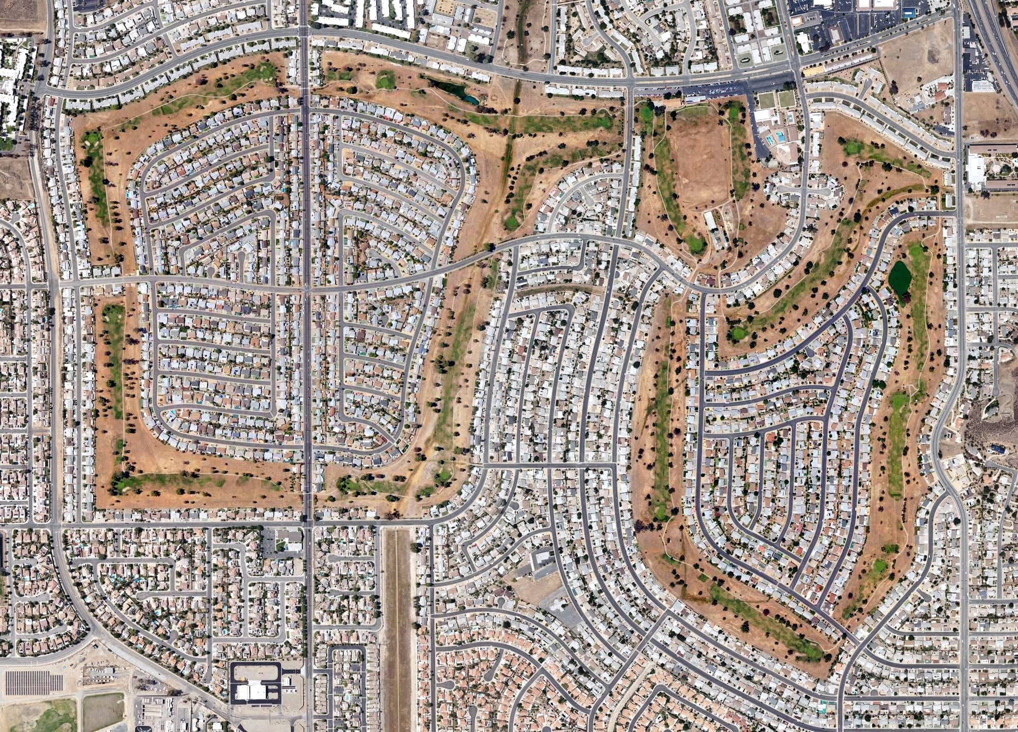 Aerial view of California Golf & Art Country Club, CA, with its hole routing marked