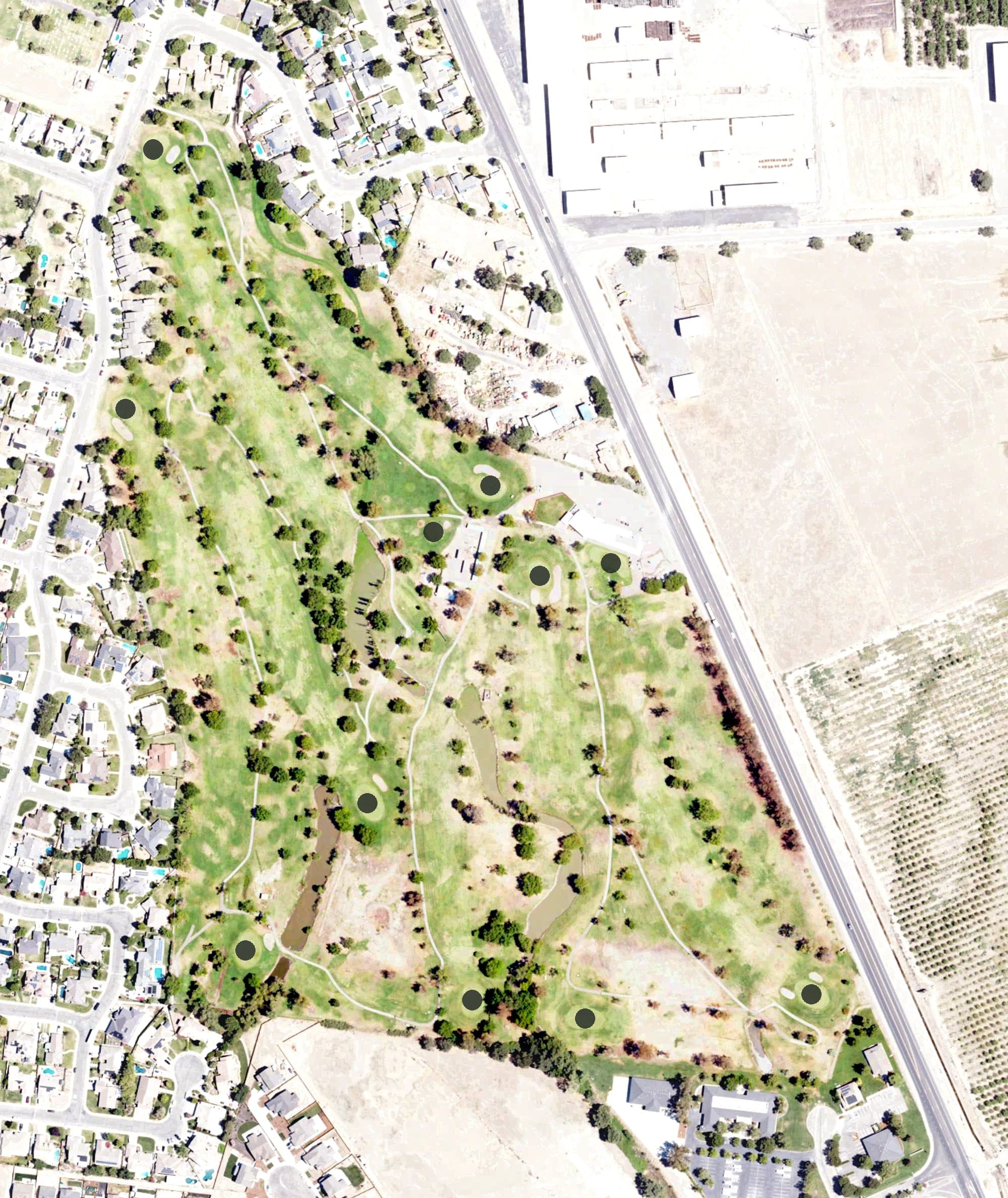 Aerial view of Colusa Golf and Country Club, CA, with its hole routing marked