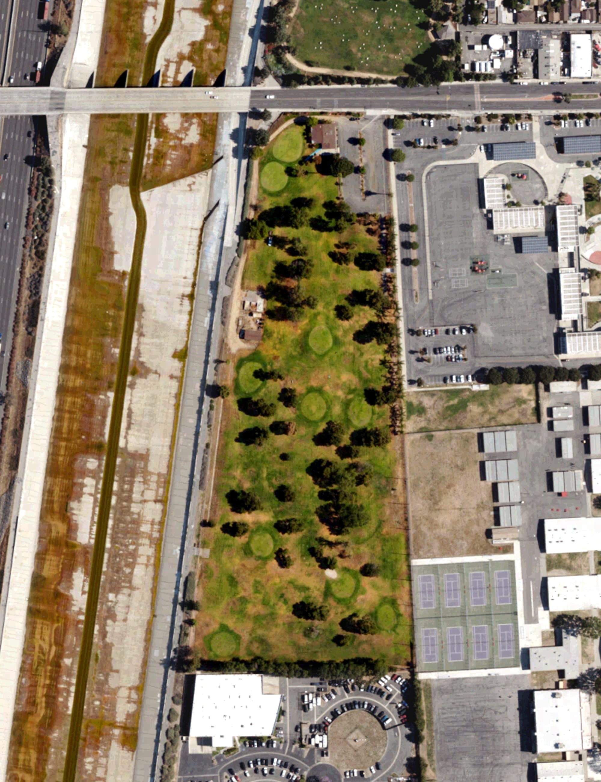 Aerial view of Compton Par 3 Golf Course, CA, with its hole routing marked
