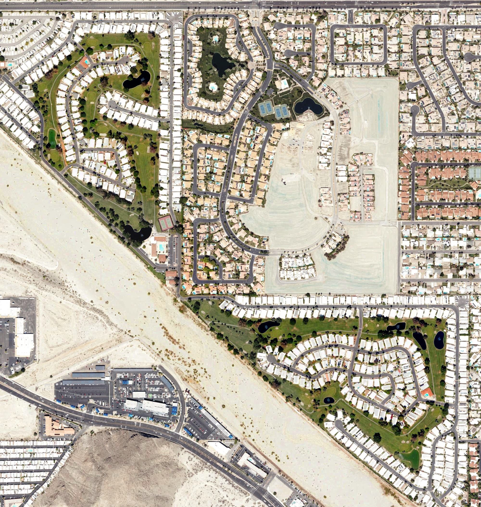 Aerial view of Date Palm Country Club, CA, with its hole routing marked