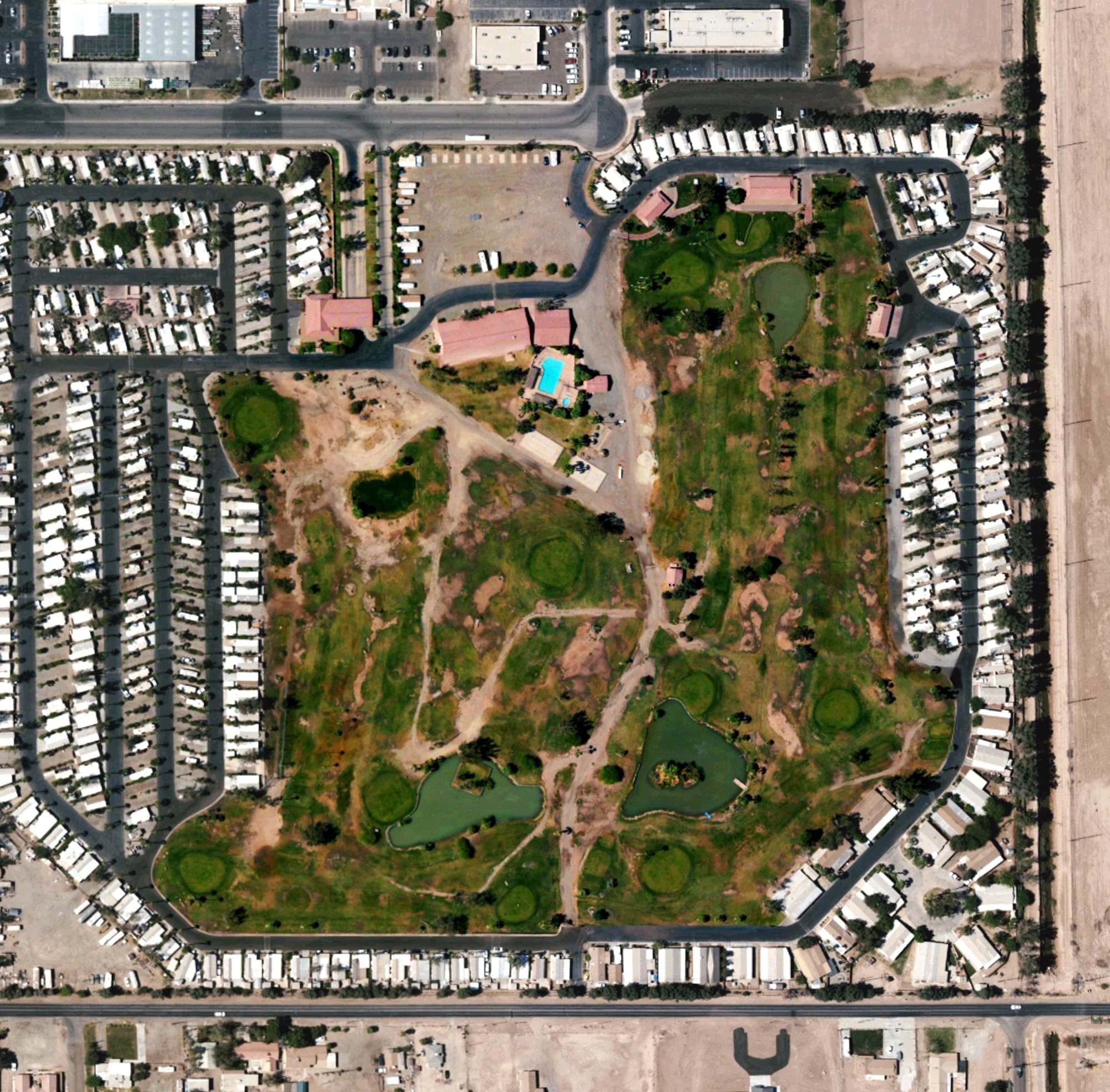 Aerial view of Desert Trails Golf Course, CA, with its hole routing marked