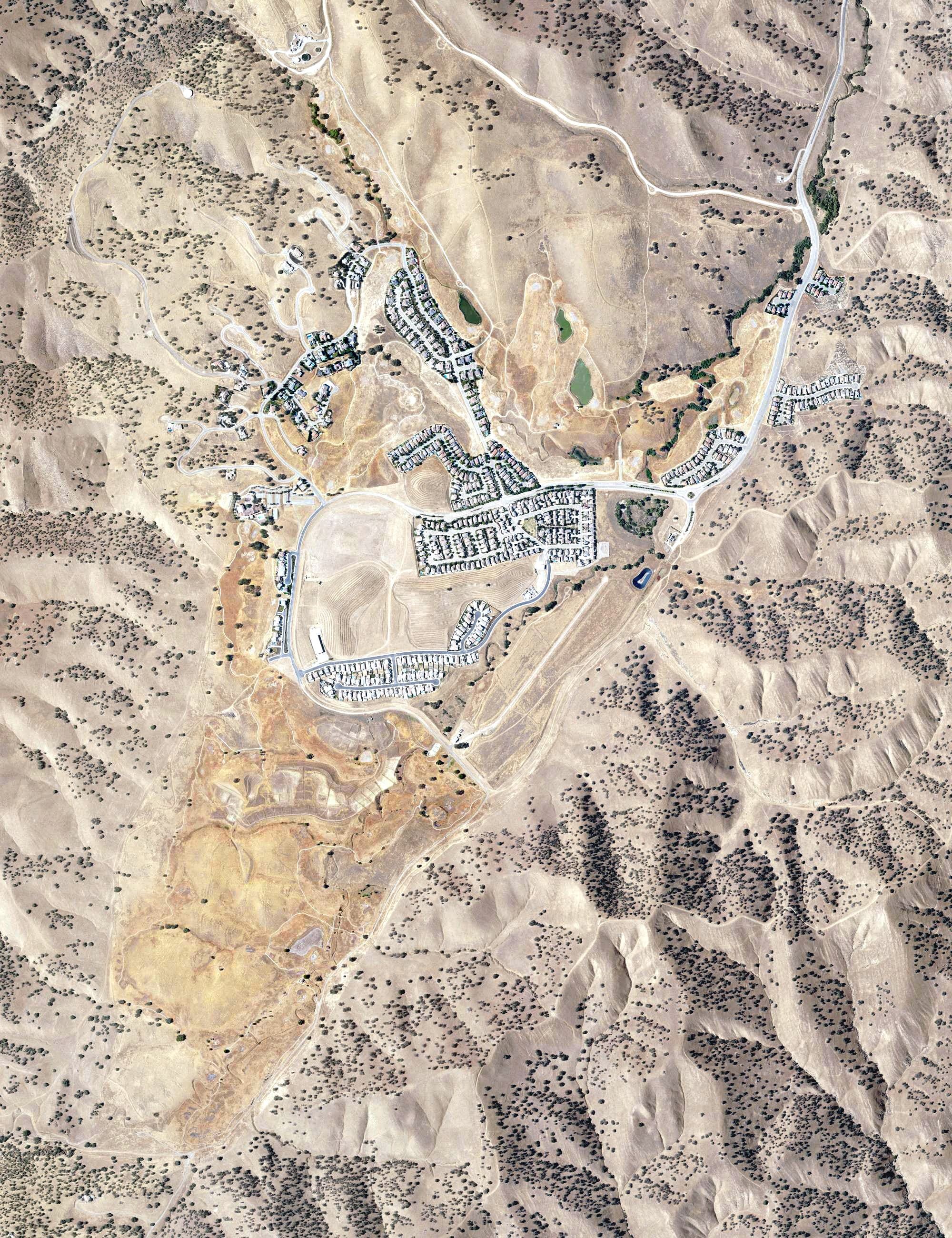 Aerial view of Diablo Grande Golf & Country Club, CA, with its hole routing marked