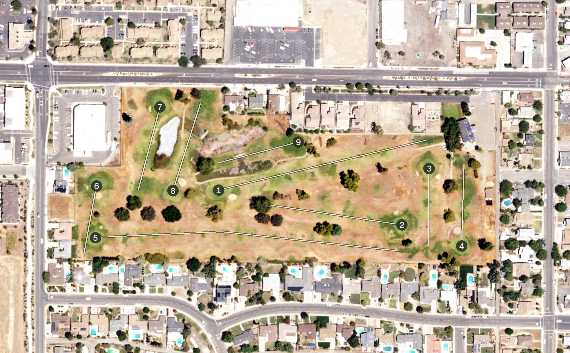 Aerial view of Exeter Golf Course, CA, with its hole routing marked