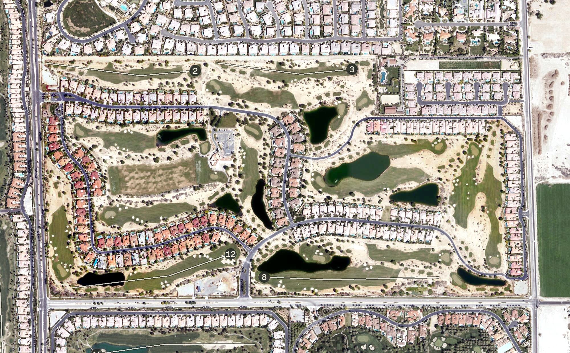 Aerial view of Greg Norman Course Resort Course (PGA West), CA, with its hole routing marked