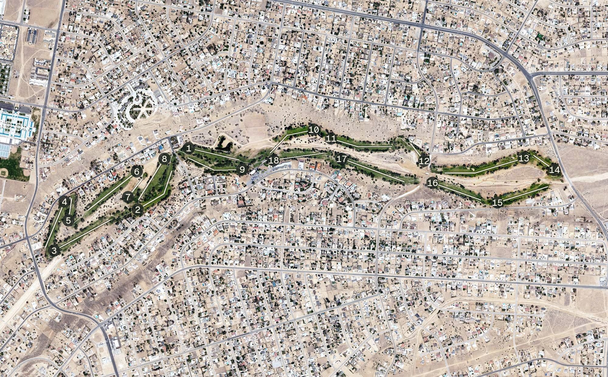 Aerial view of Hesperia Golf & Country Club, CA, with its hole routing marked