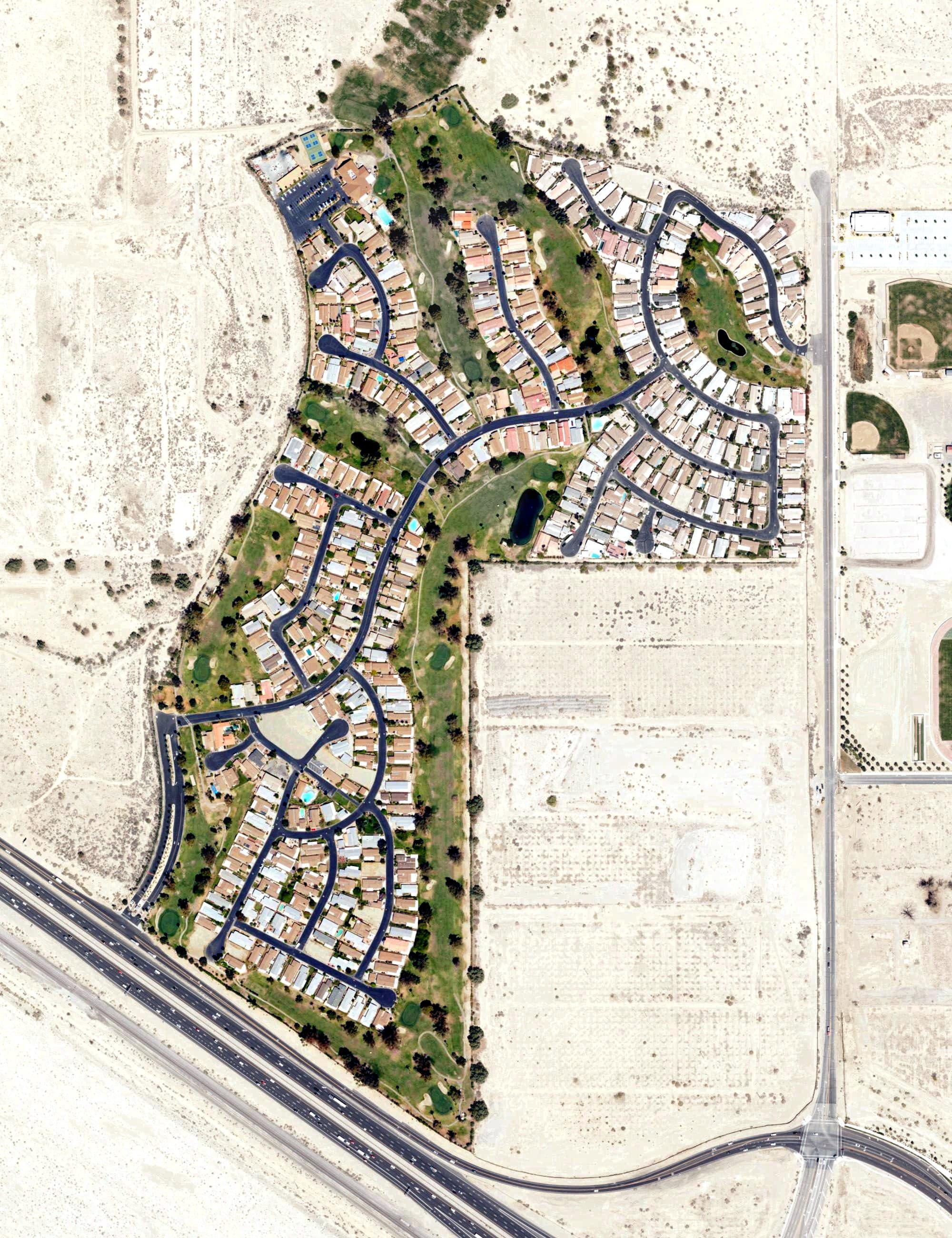 Aerial view of Ivey Ranch Country Club, CA, with its hole routing marked