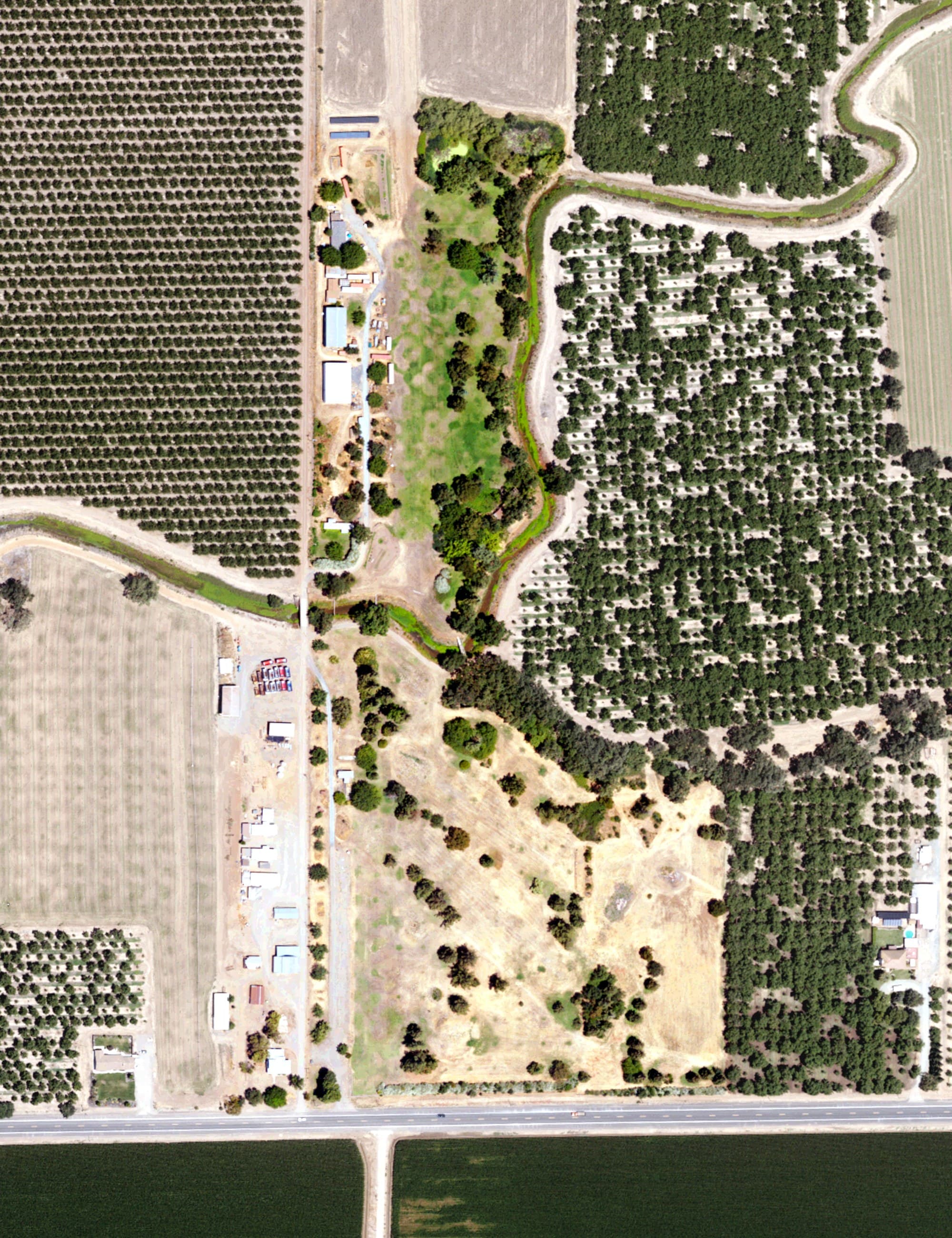 Aerial view of J B Golf Course, CA, with its hole routing marked