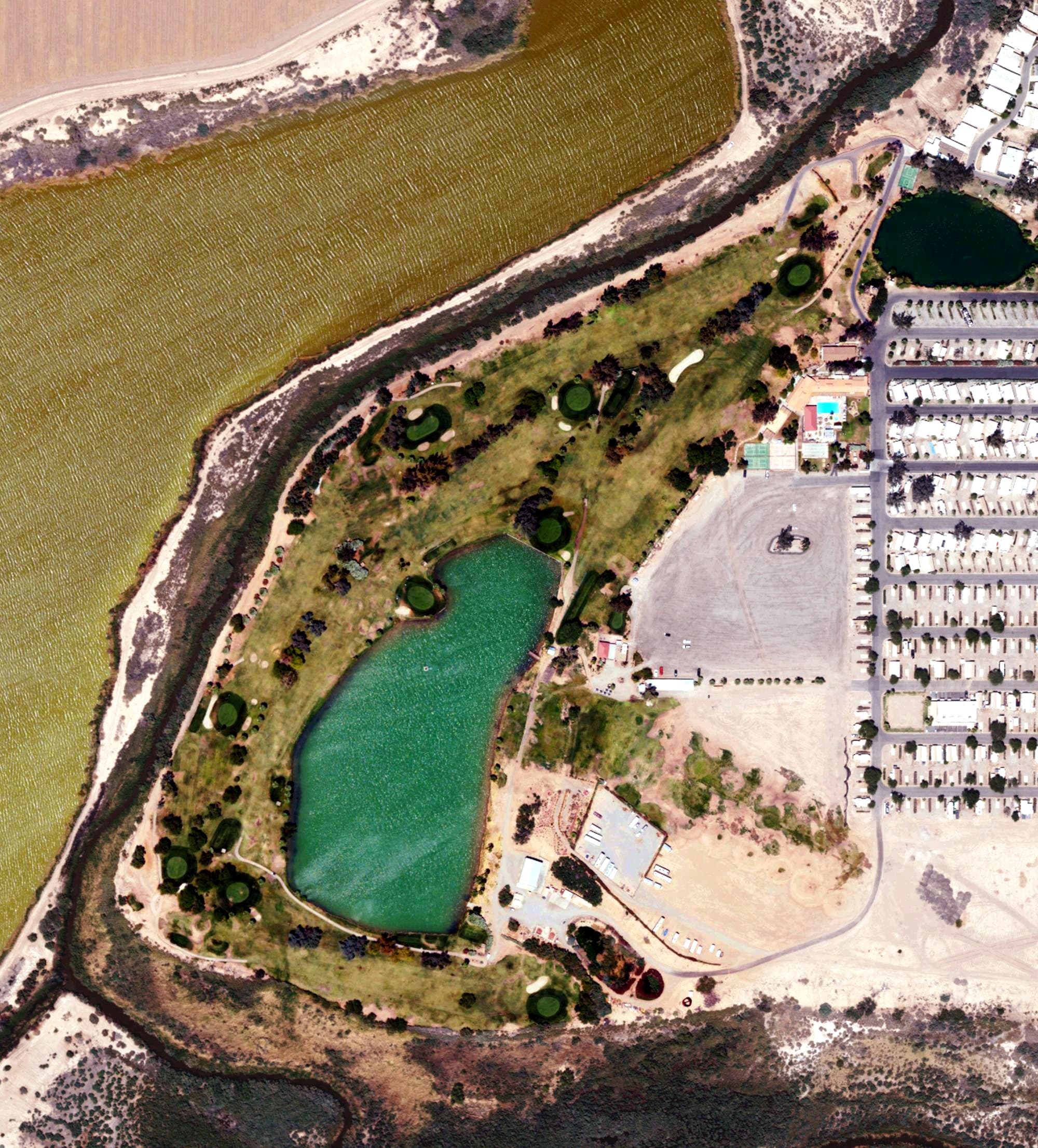 Aerial view of Lakeview Golf Course at Rio Bend, CA, with its hole routing marked