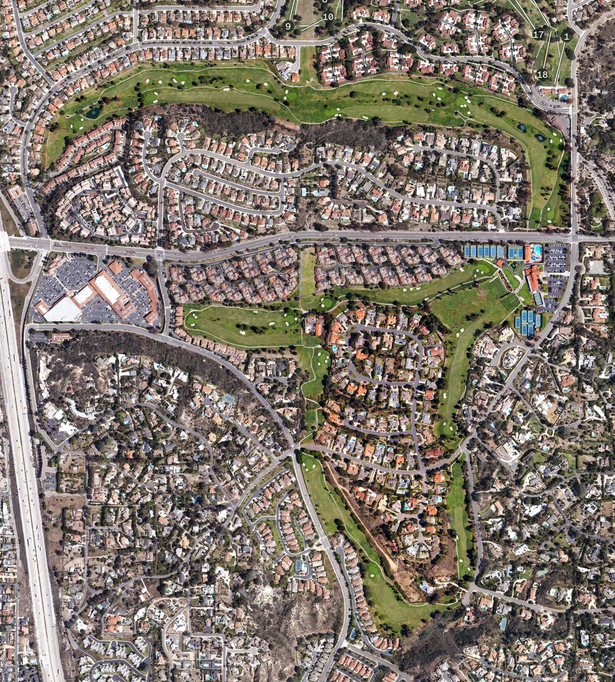 Aerial view of Lomas Santa Fe Country Club, CA, with its hole routing marked