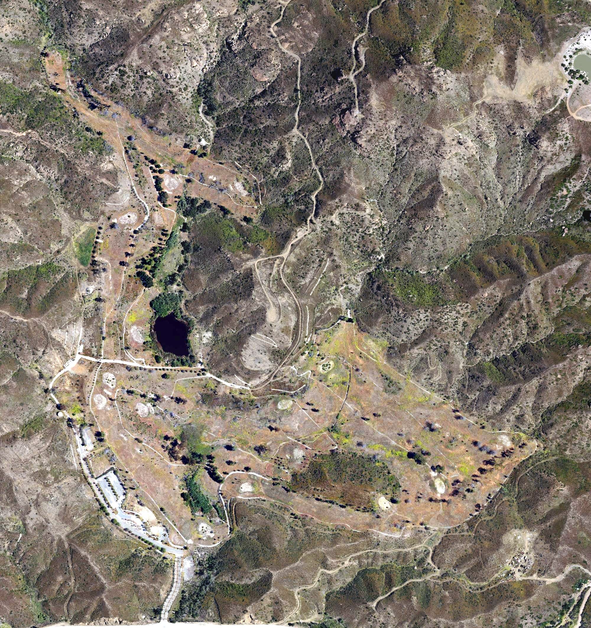 Aerial view of Malibu Golf Club, CA, with its hole routing marked