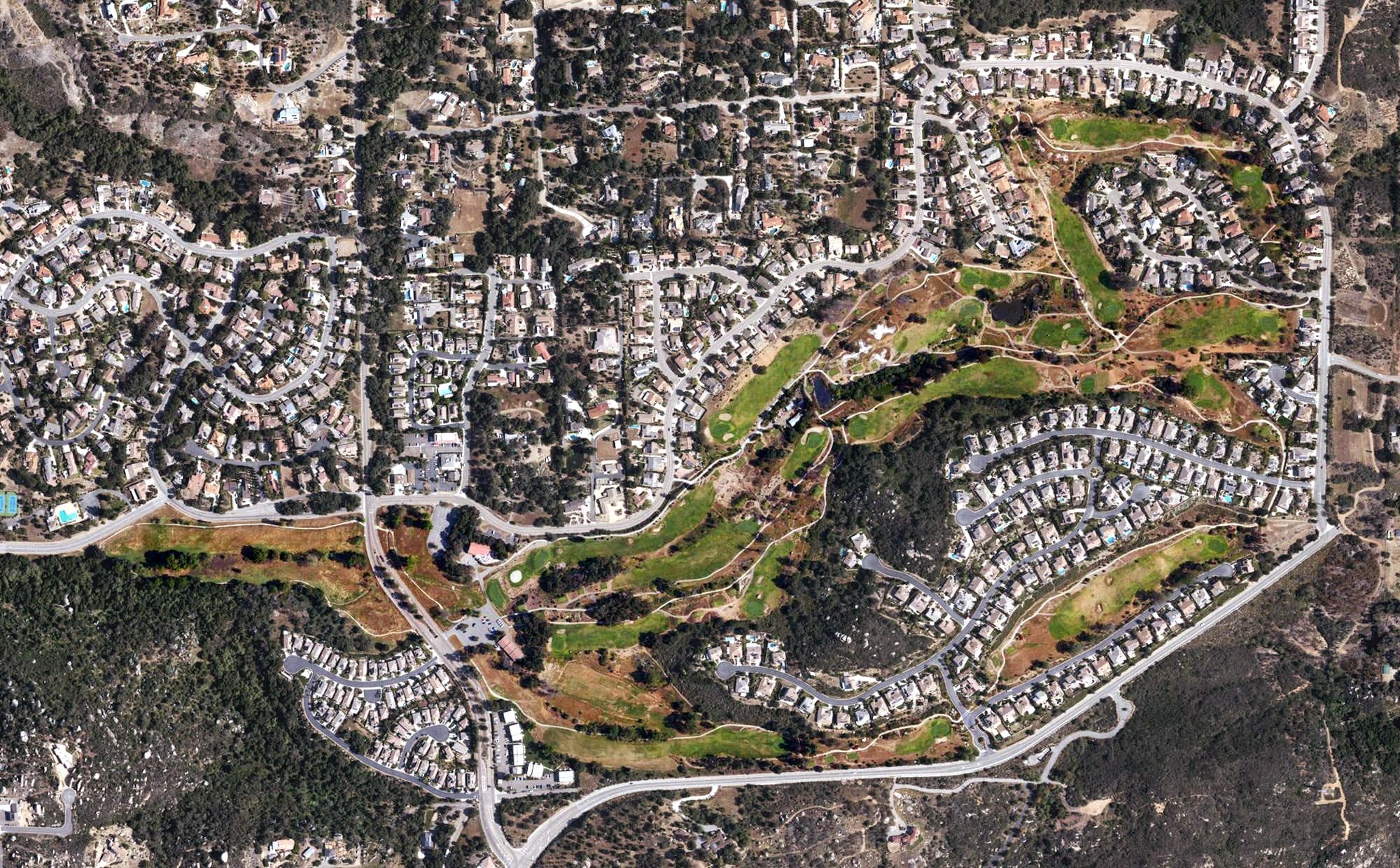 Aerial view of Meadow Lake Country Club, CA, with its hole routing marked