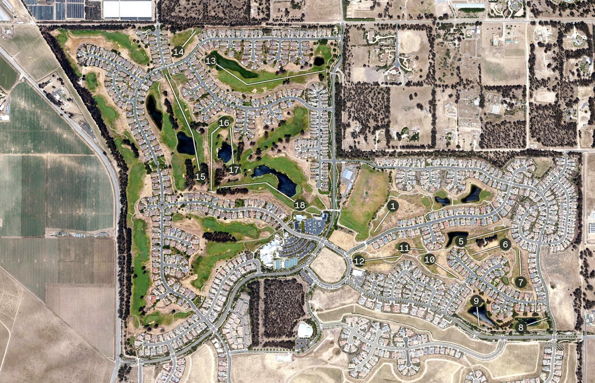 Aerial view of Monarch Dunes Golf Course, CA, with its hole routing marked