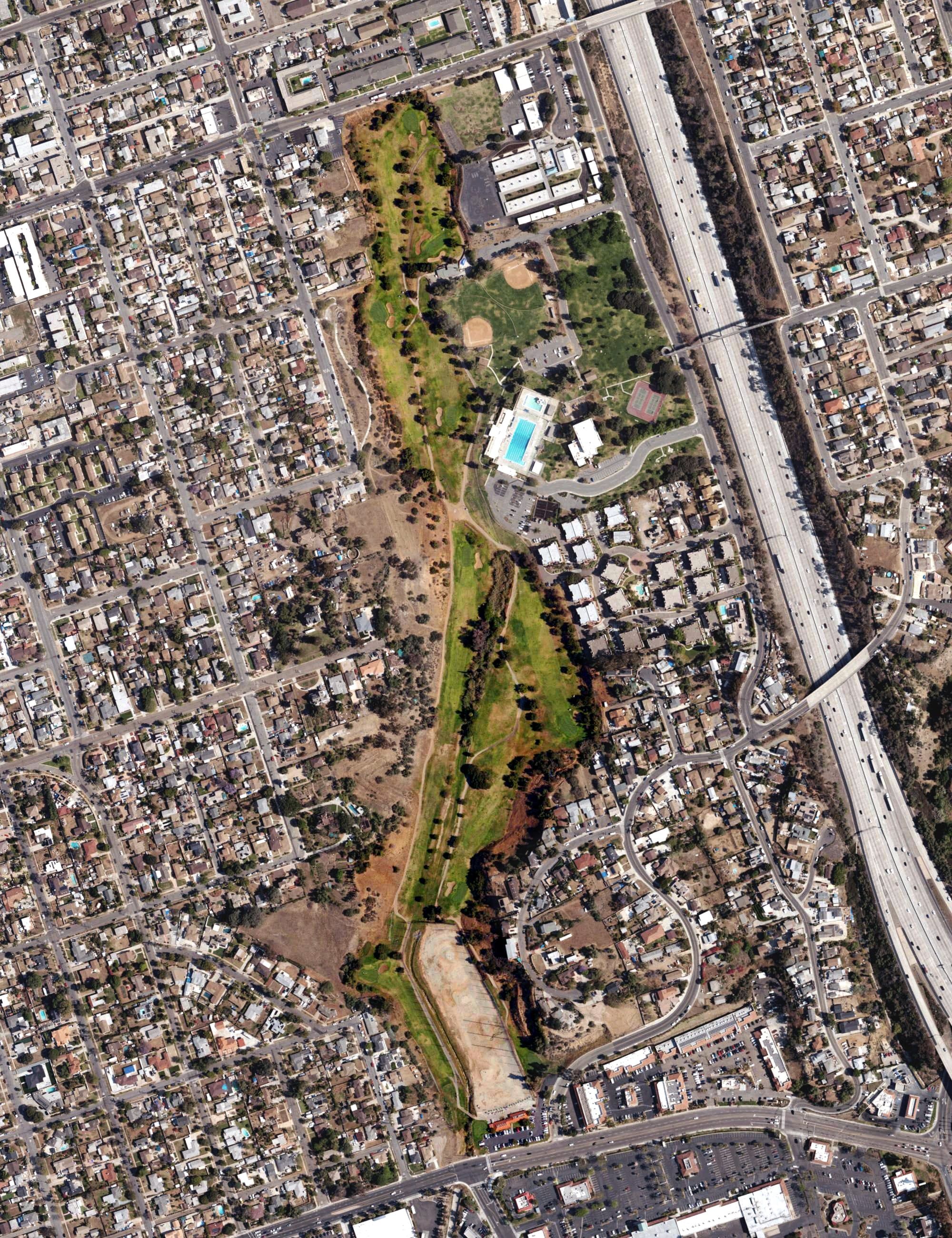 Aerial view of National City Golf Course, CA, with its hole routing marked