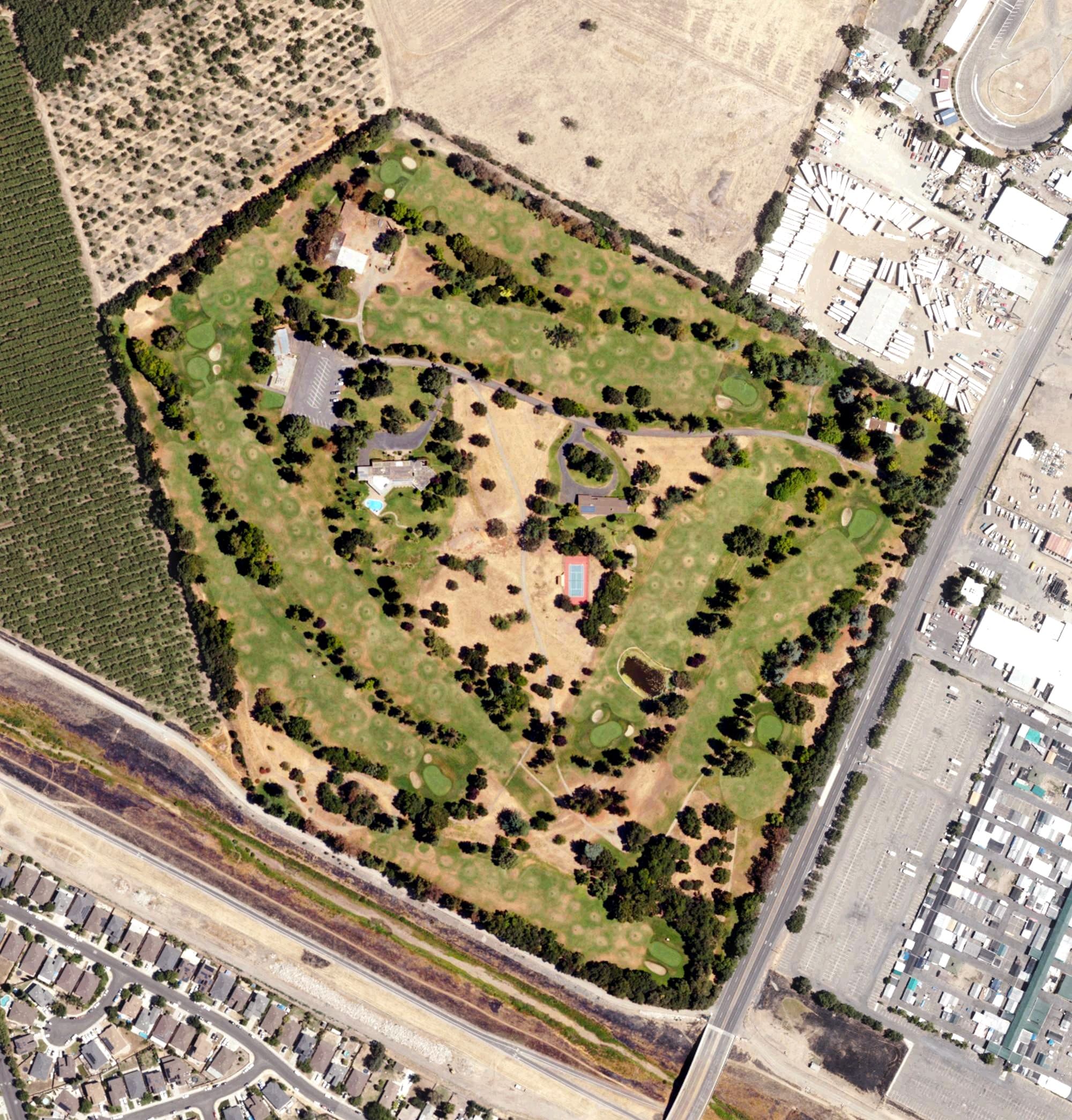 Aerial view of Oakmoore Golf Course, CA, with its hole routing marked