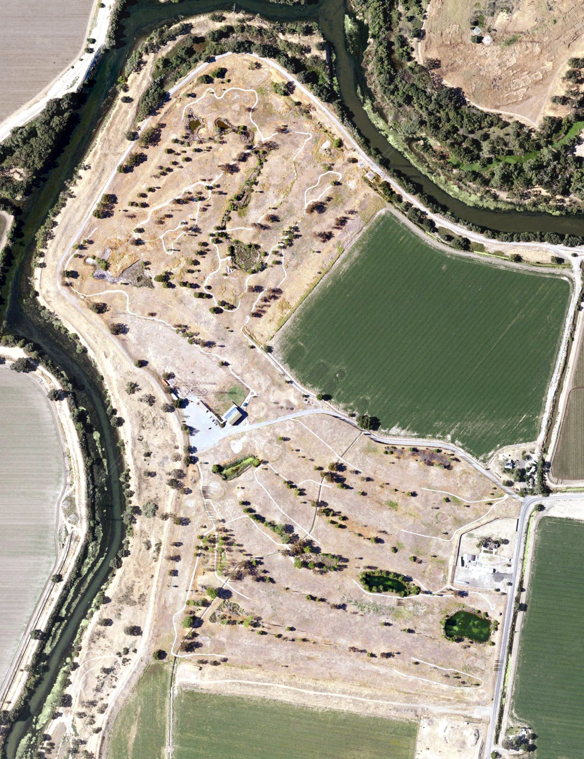 Aerial view of Old River Golf Course, CA, with its hole routing marked