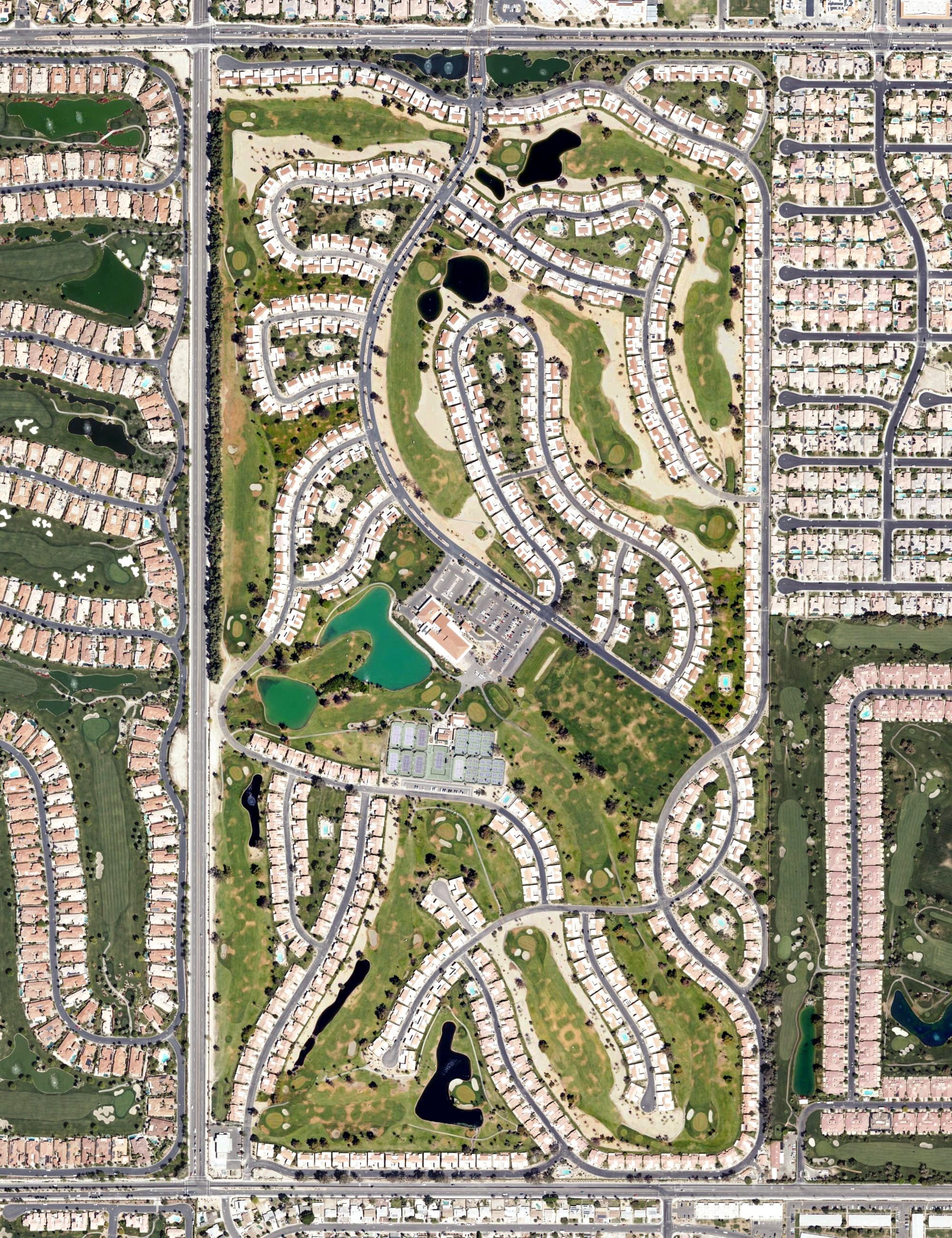Aerial view of Palm Desert Resort and Country Club, CA, with its hole routing marked