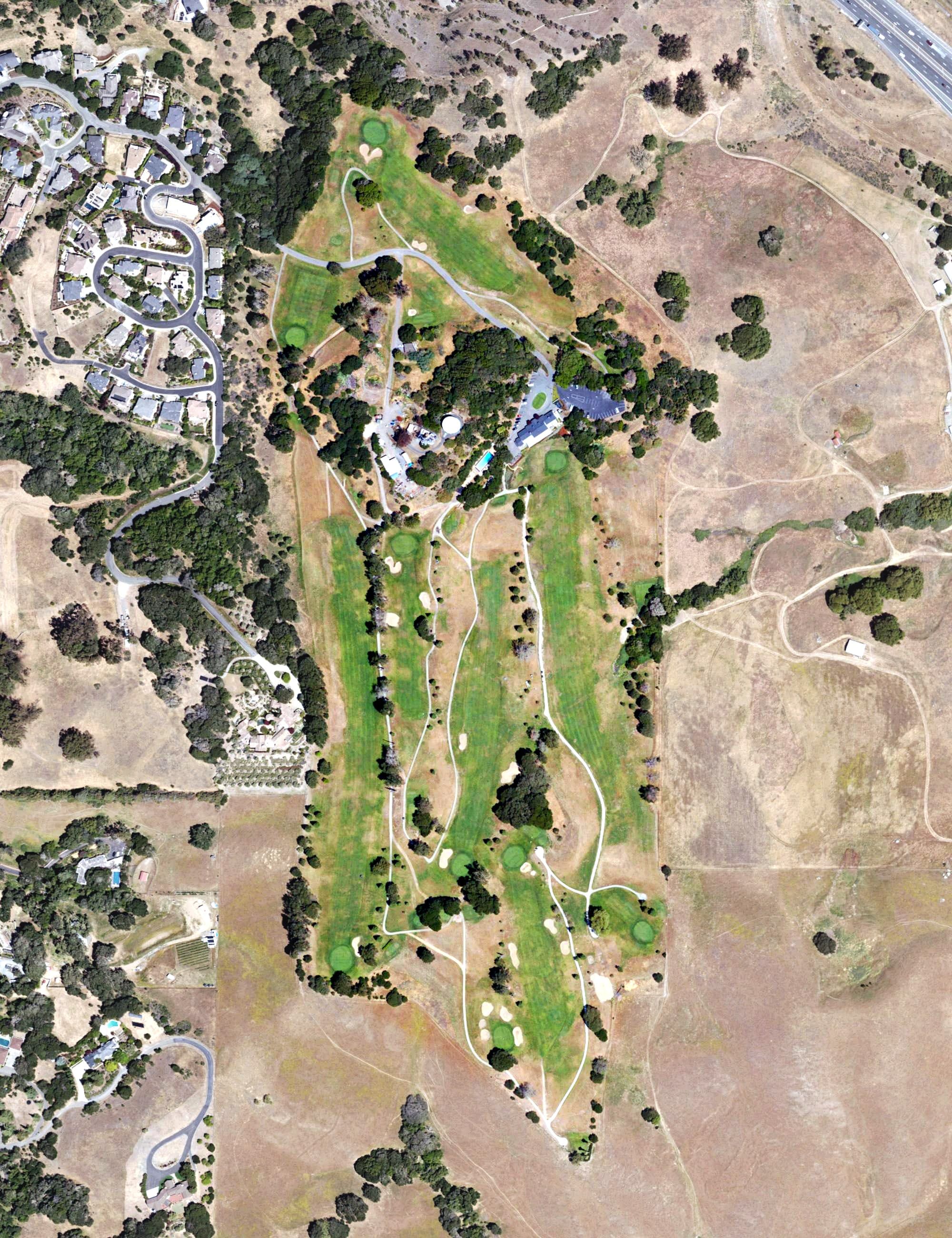 Aerial view of Petaluma Golf & Country Club, CA, with its hole routing marked