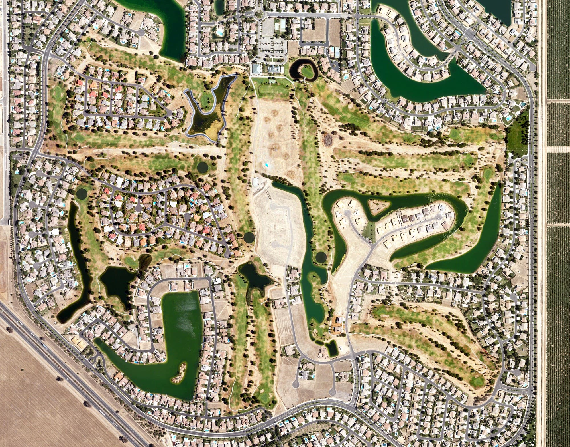 Aerial view of Pheasant Run Golf Club, CA, with its hole routing marked
