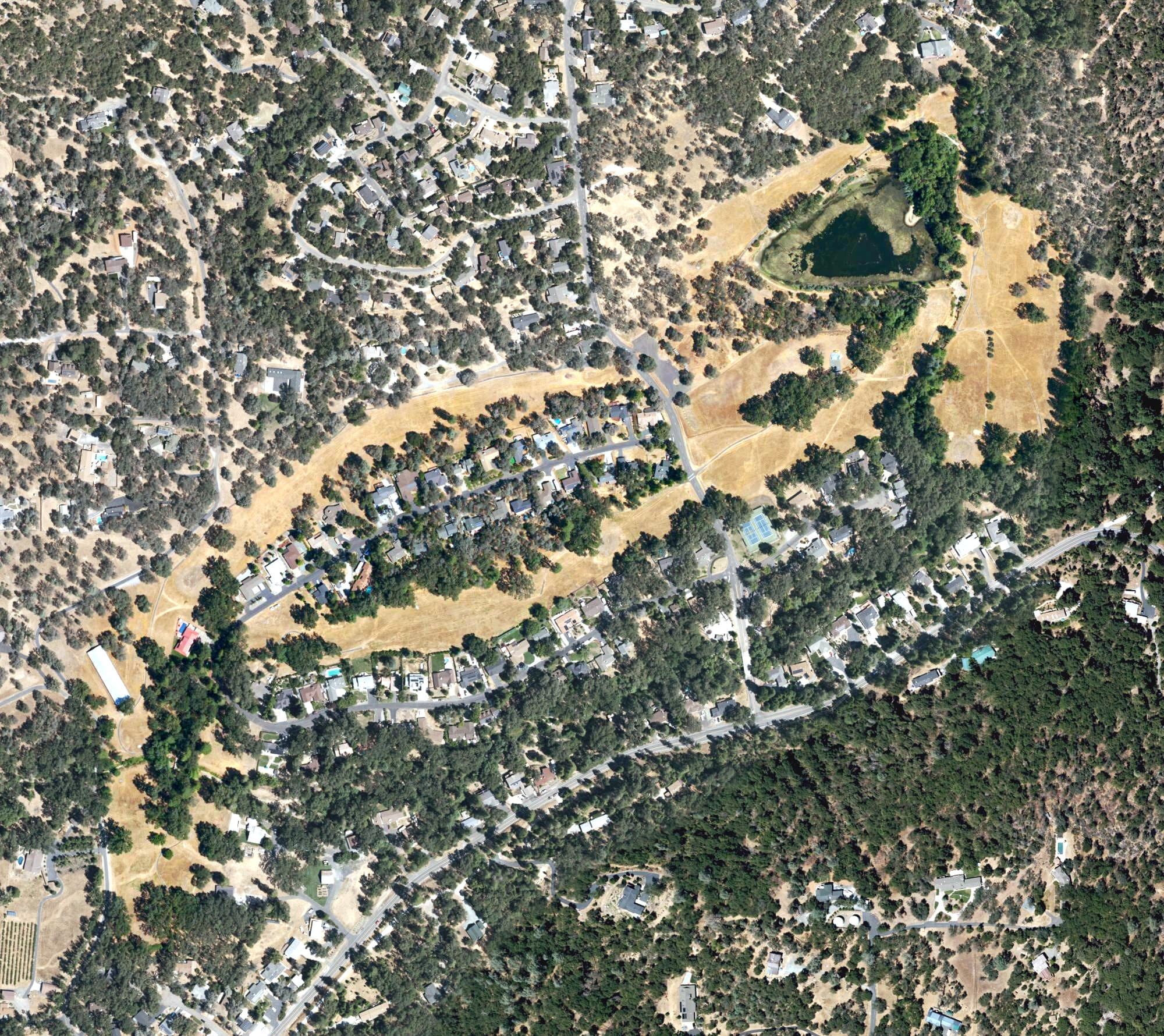 Aerial view of Phoenix Lake Golf Course, CA, with its hole routing marked