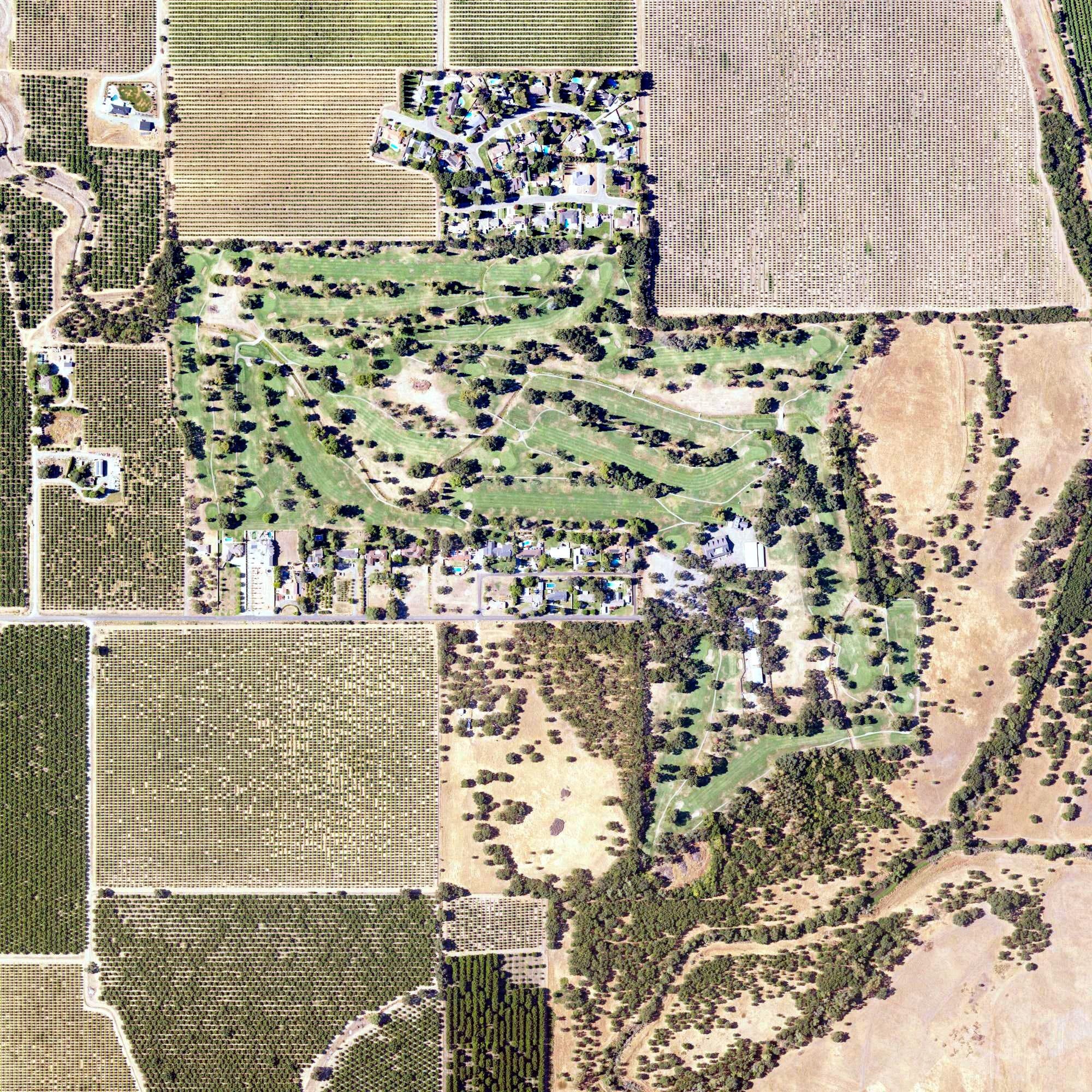 Aerial view of Plumas Lake Golf & Country Club, CA, with its hole routing marked