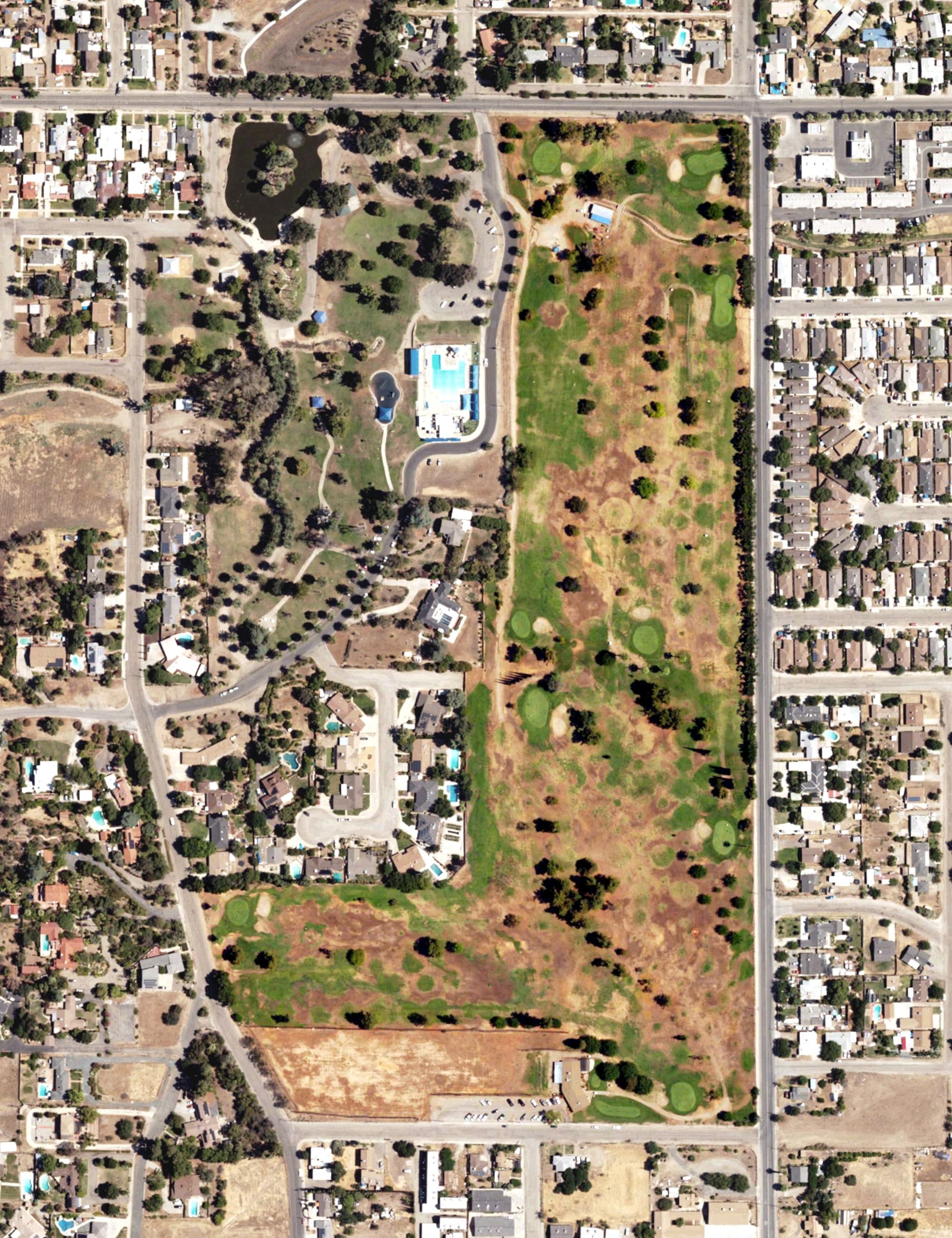Aerial view of Porterville Municipal Golf Couse, CA, with its hole routing marked