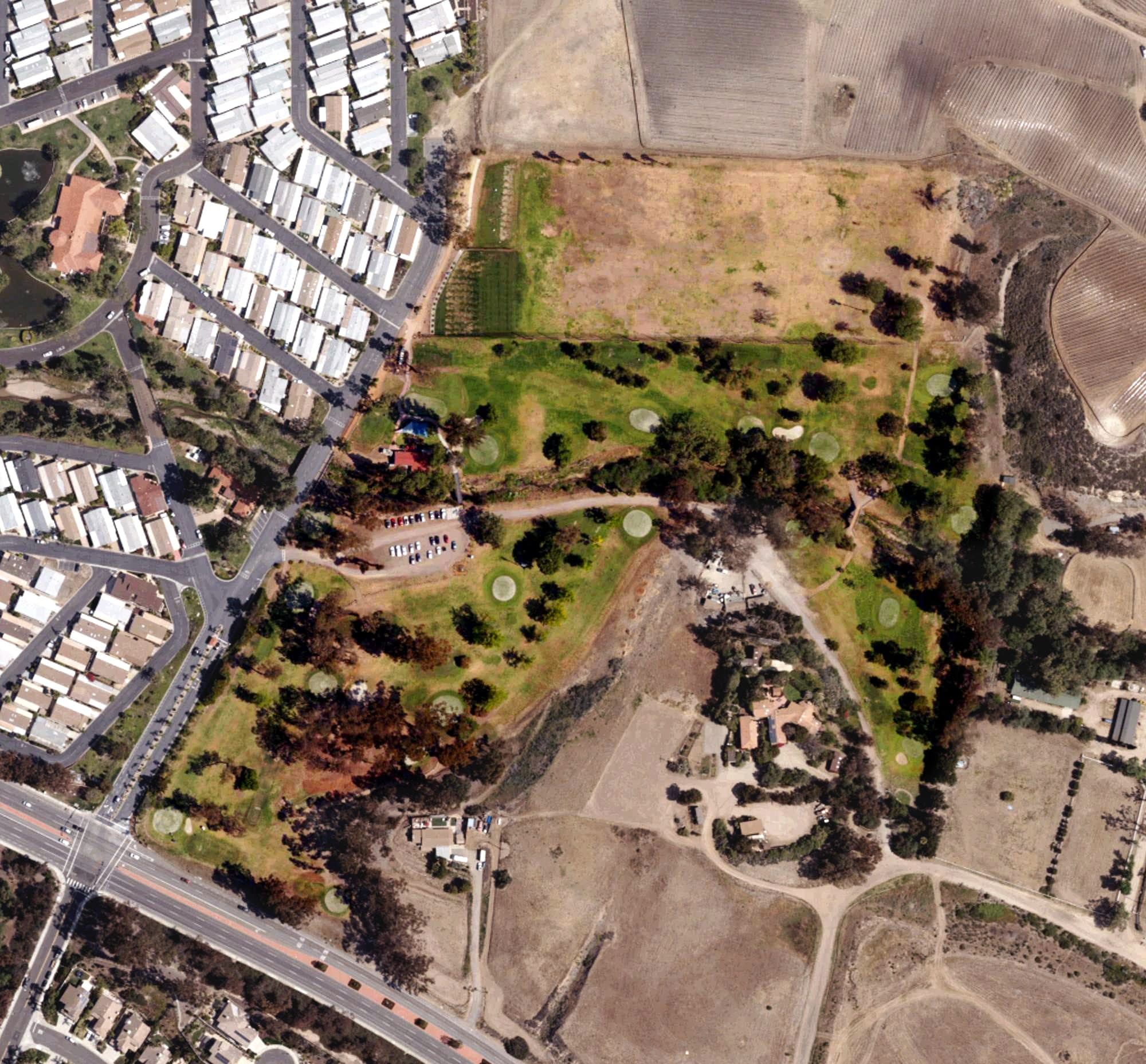 Aerial view of Rancho Carlsbad Golf Course, CA, with its hole routing marked