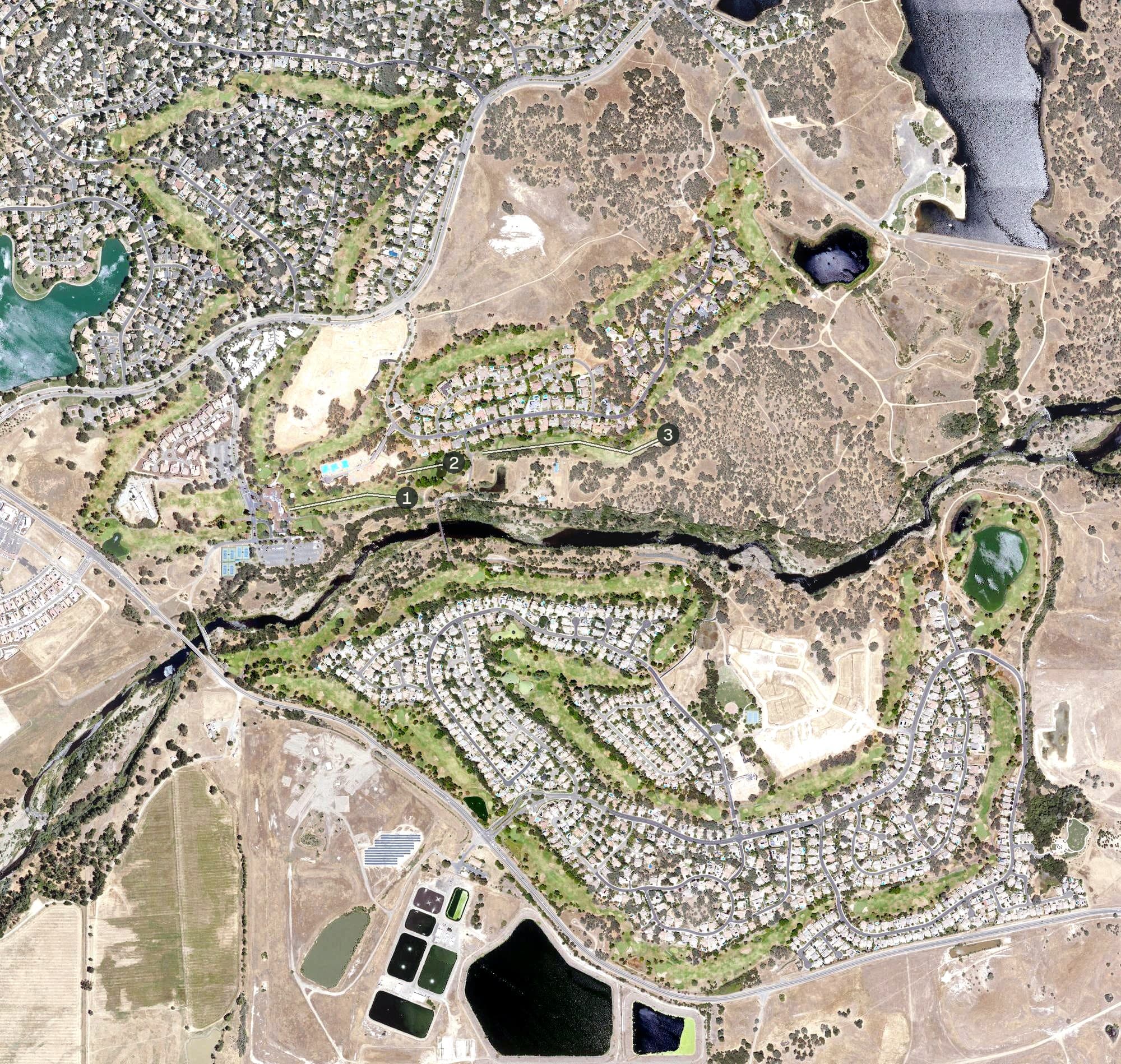 Aerial view of Rancho Murieta Golf & Country Club, CA, with its hole routing marked