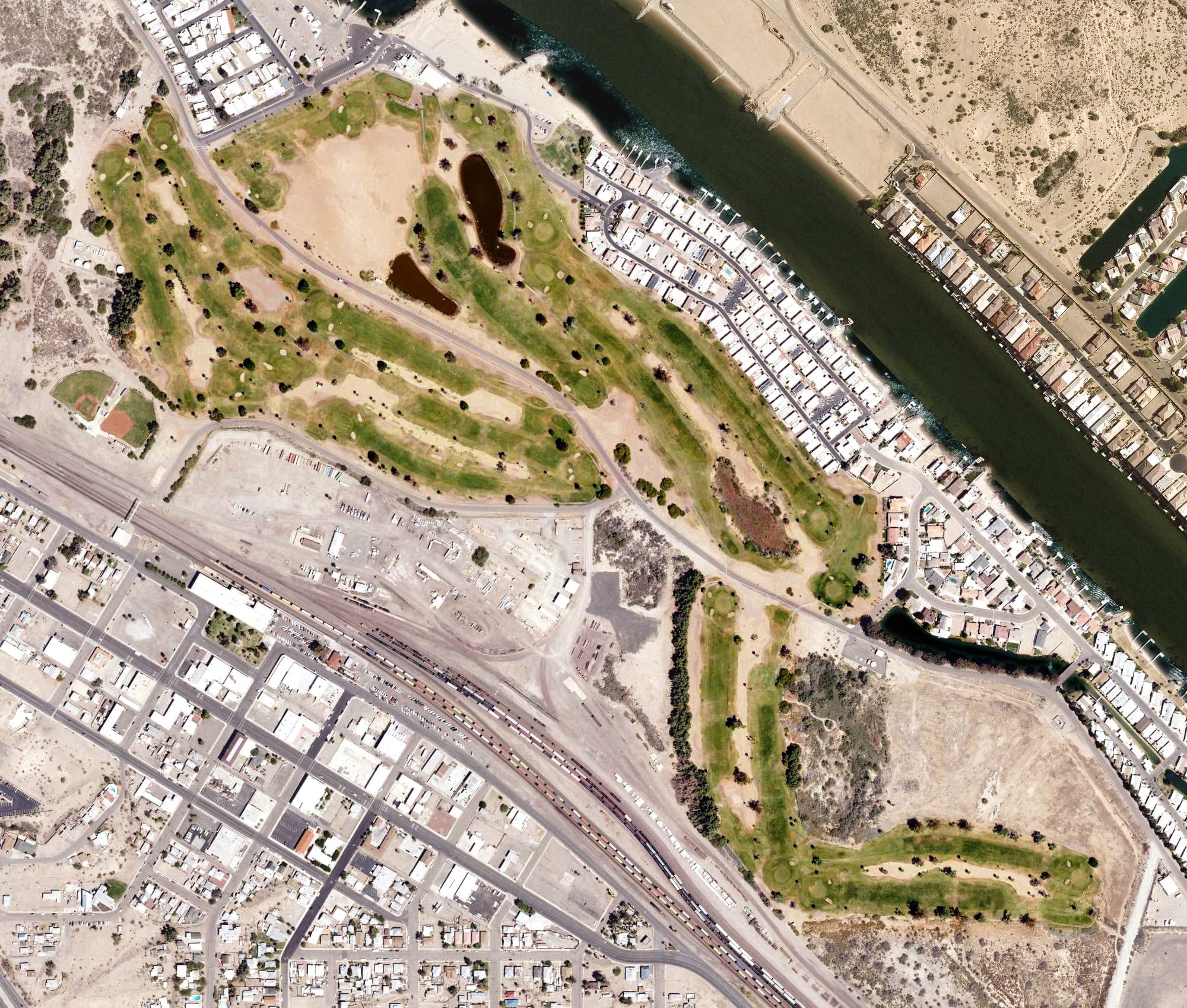 Aerial view of Rivers Edge Golf Course (Needles Municipal), CA, with its hole routing marked