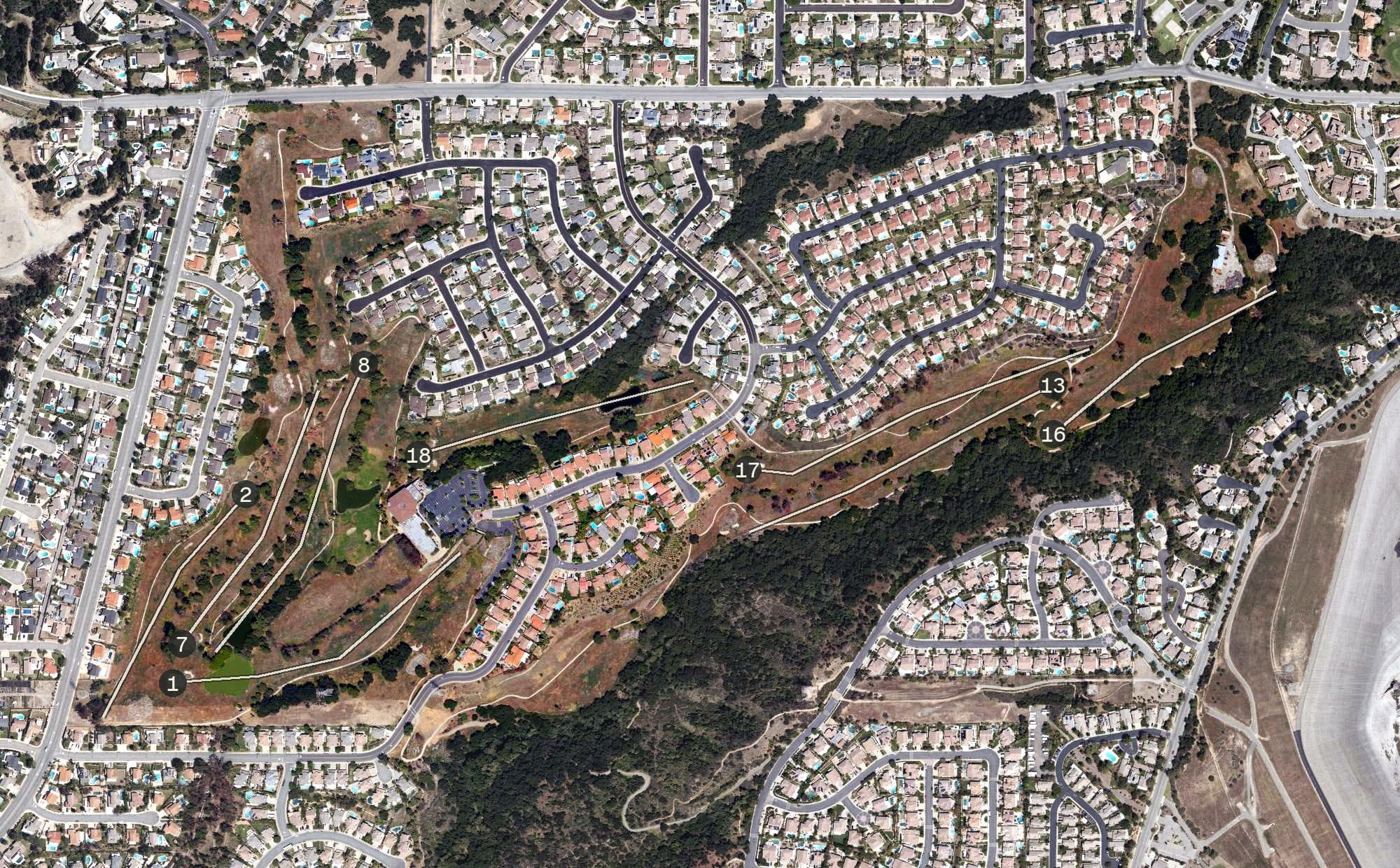 Aerial view of Sierra La Verne Country Club, CA, with its hole routing marked