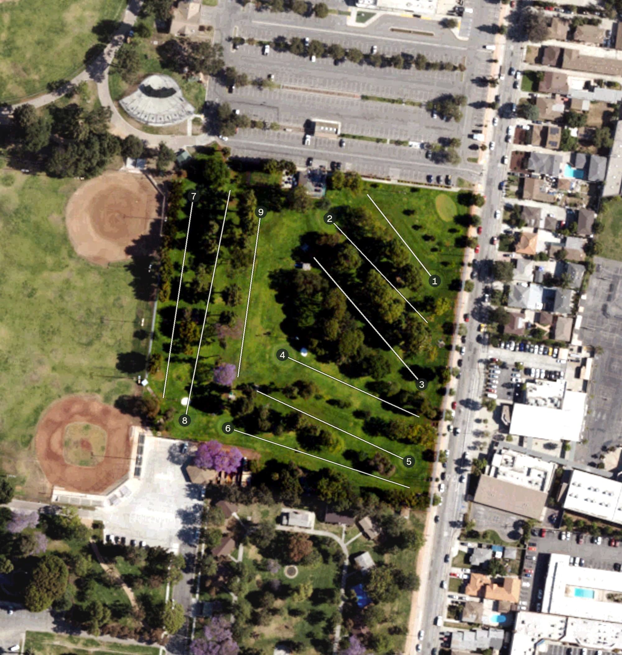 Aerial view of South Gate Golf Course, CA, with its hole routing marked