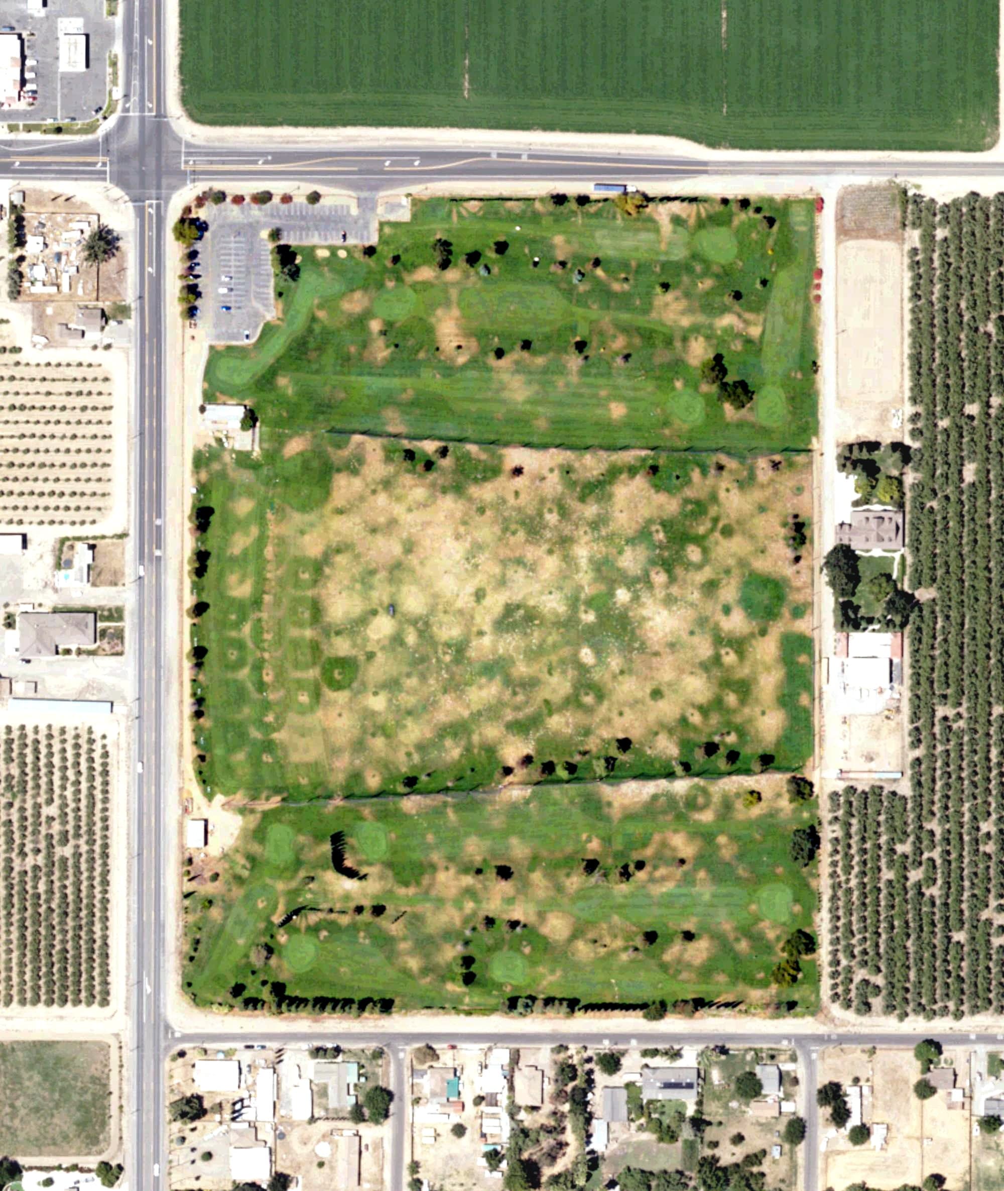 Aerial view of St. Stanislaus Golf Course, CA, with its hole routing marked