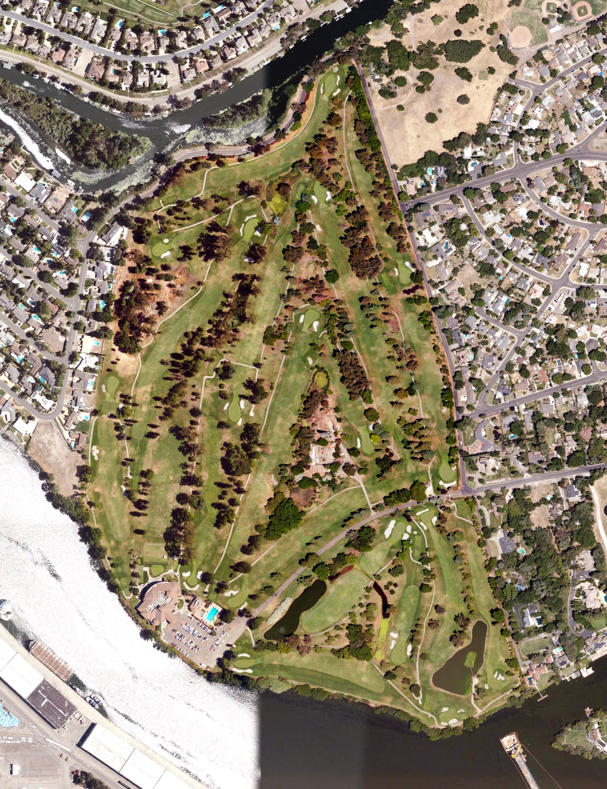 Aerial view of Stockton Golf and Country Club, CA, with its hole routing marked