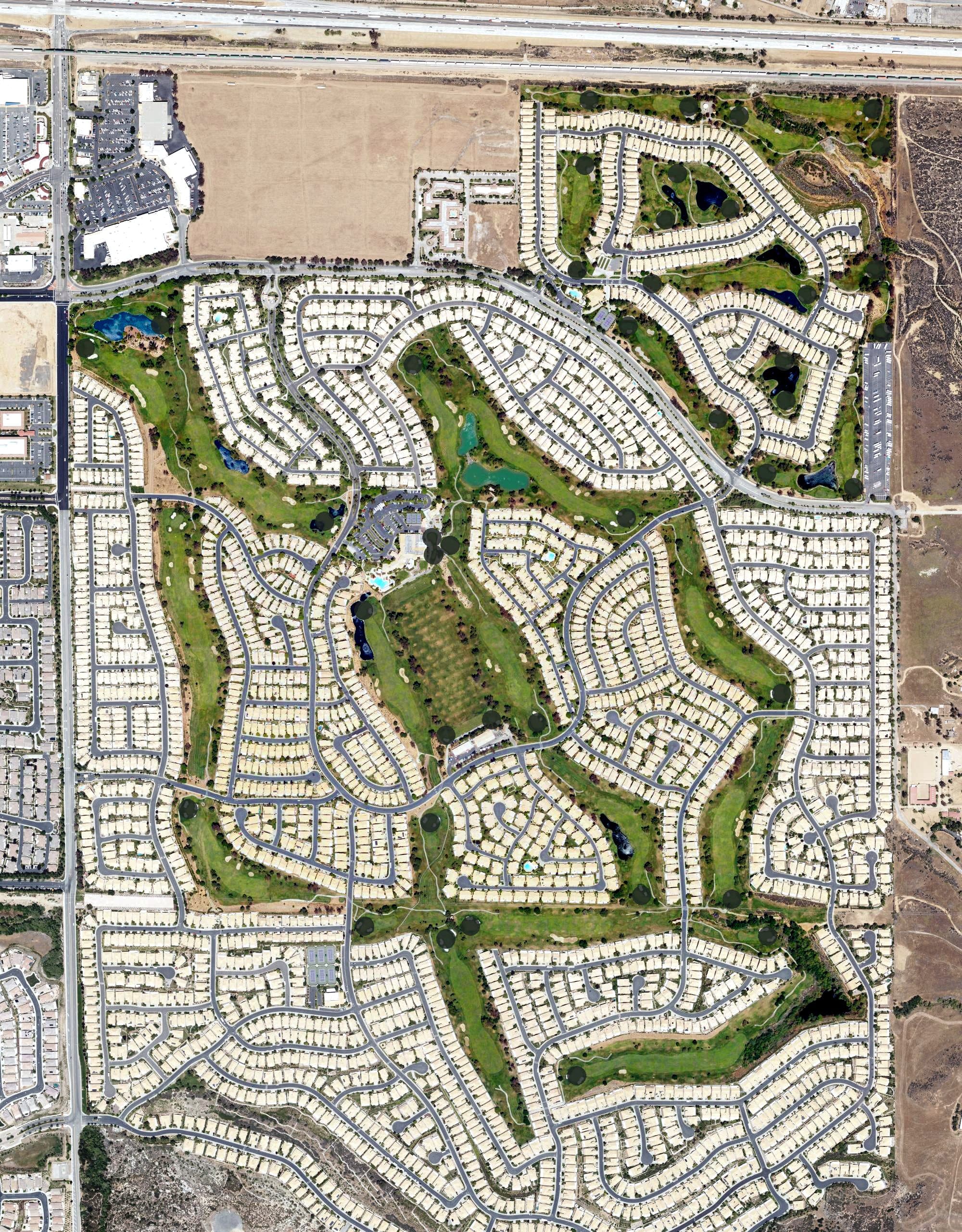 Aerial view of Sun Lakes Country Club and Golf Course, CA, with its hole routing marked