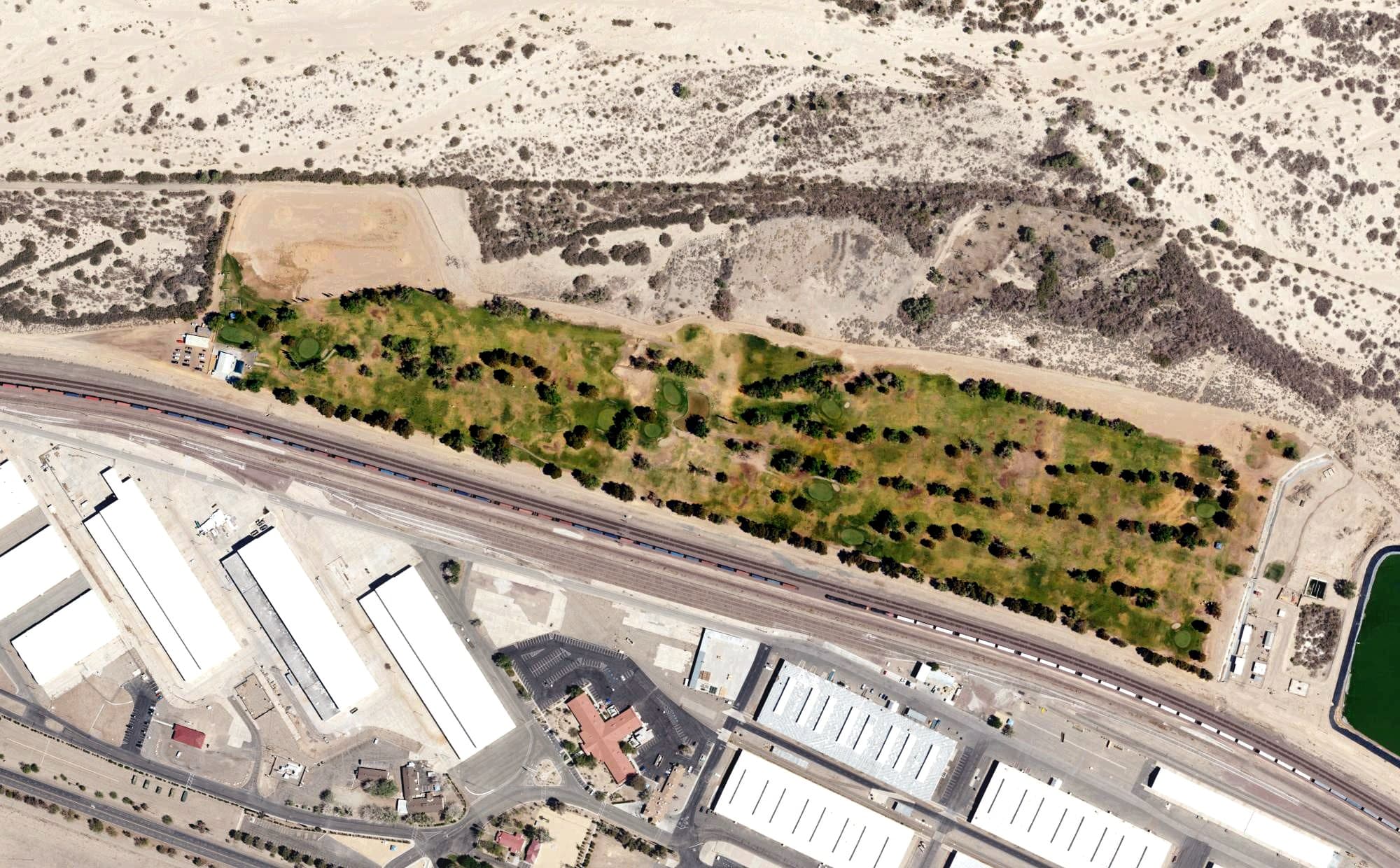 Aerial view of Tees & Trees Golf Course, CA, with its hole routing marked