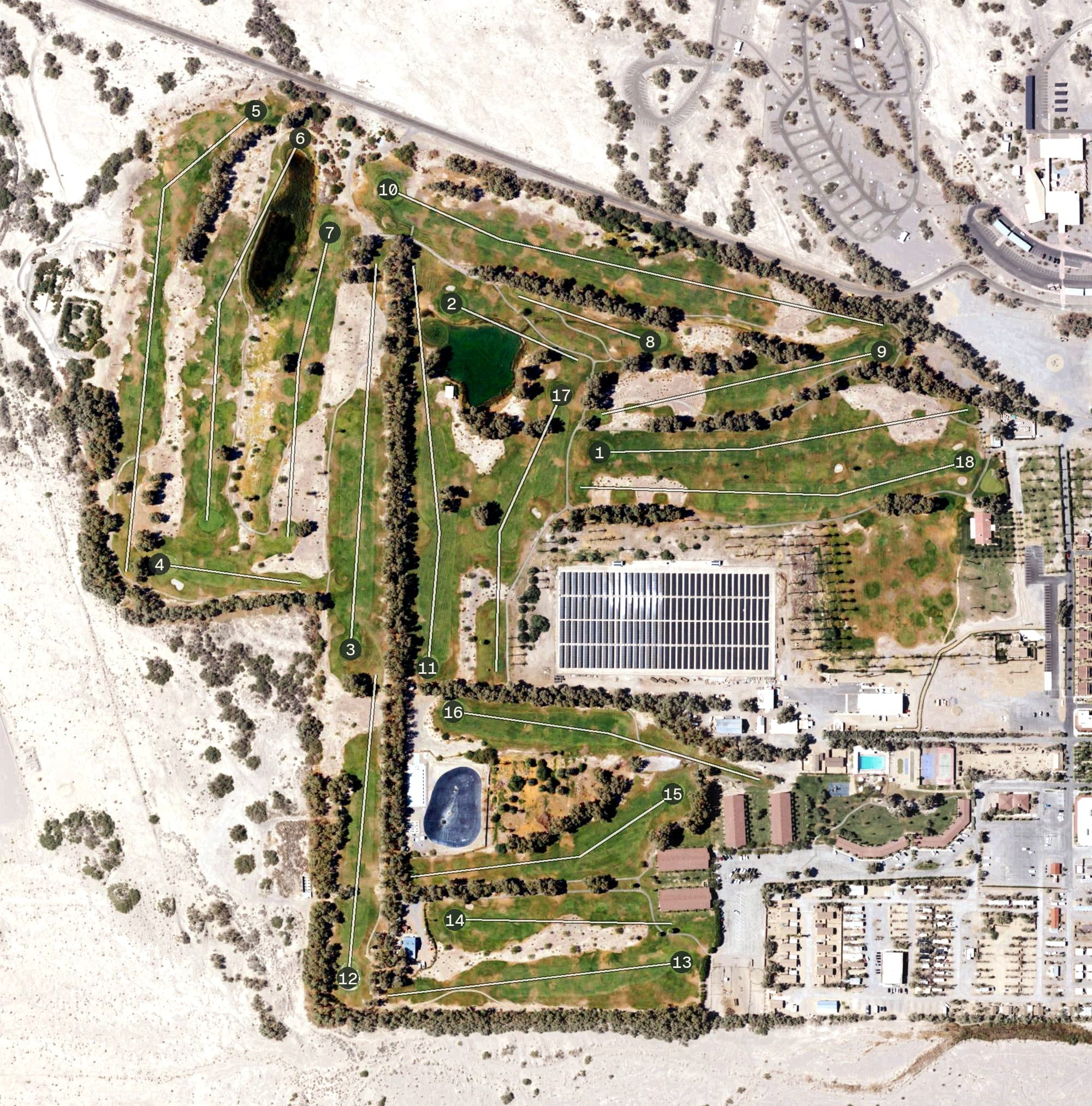 Aerial view of The Furnace Creek Golf Course at Death Valley, CA, with its hole routing marked