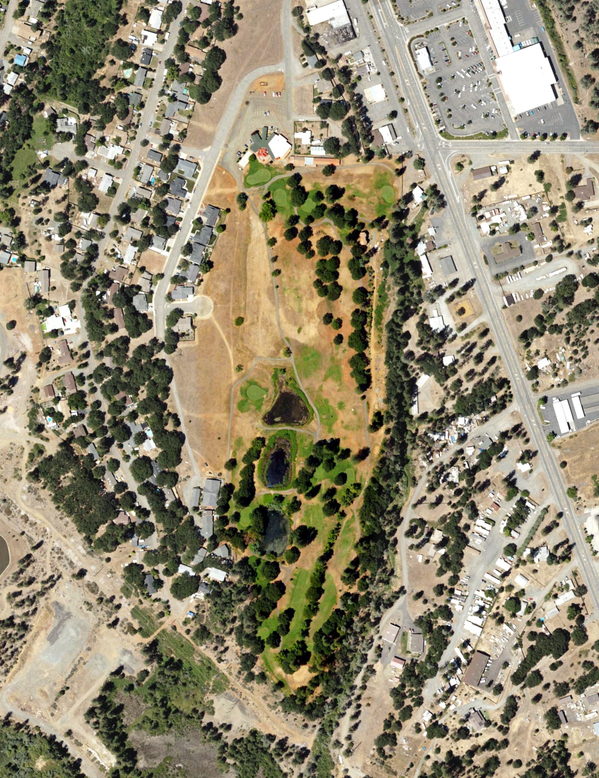 Aerial view of Trinity Alps Golf Course, CA, with its hole routing marked