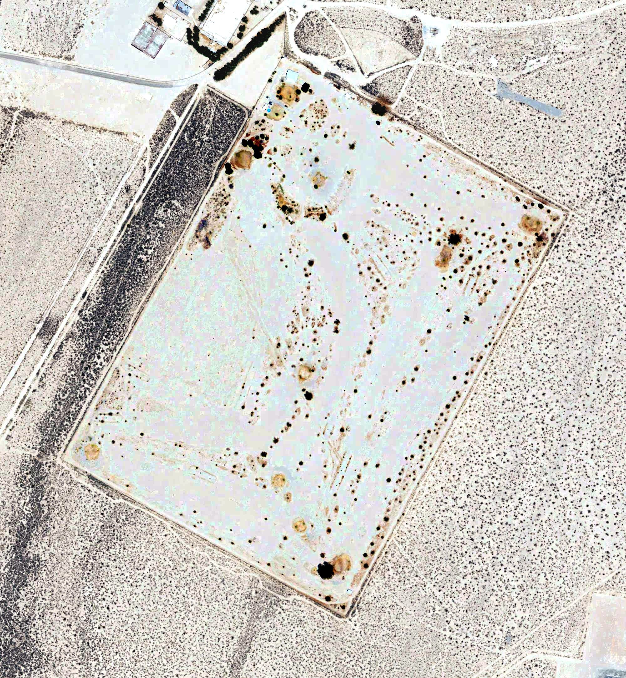 Aerial view of Trona Golf Course, CA, with its hole routing marked