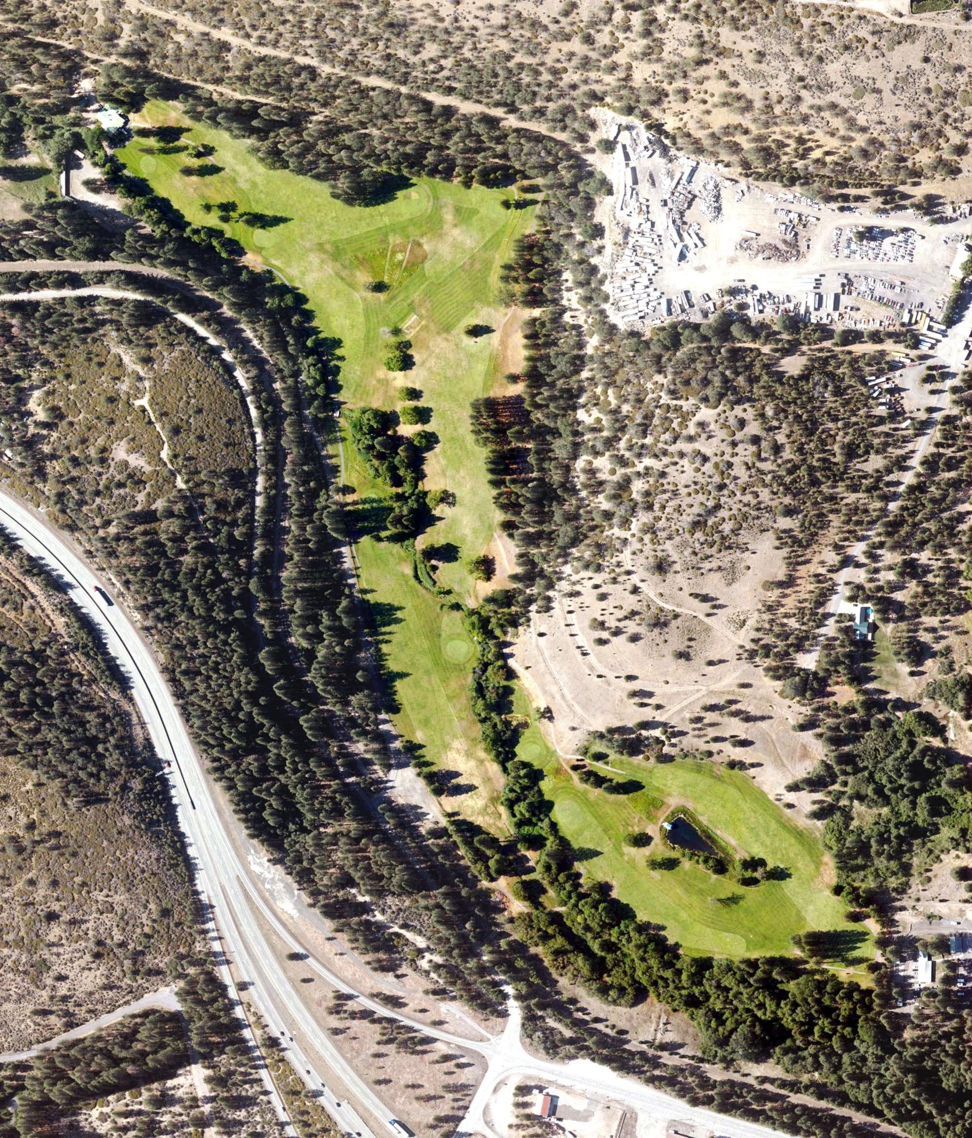 Aerial view of Weed Golf Club, CA, with its hole routing marked