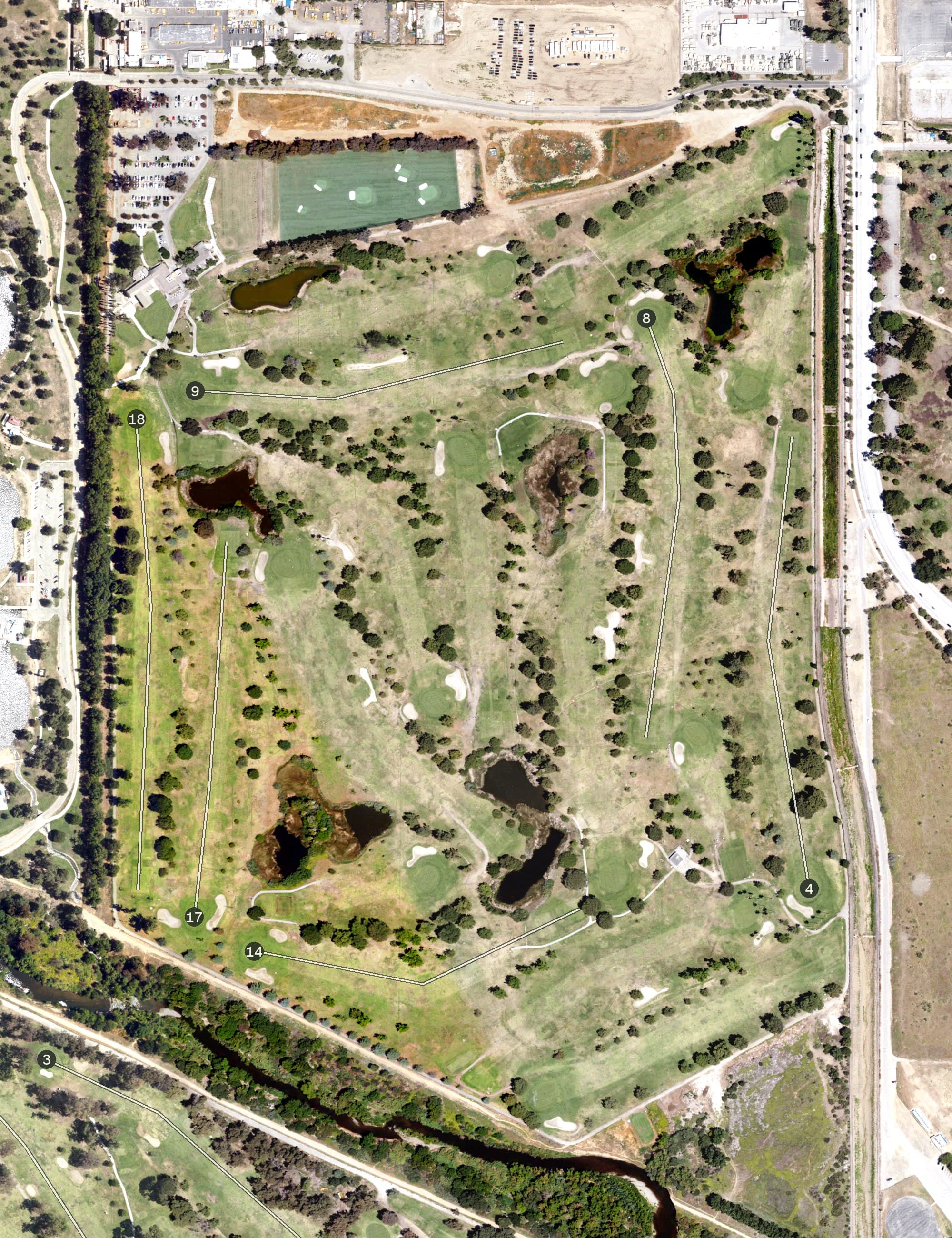 Aerial view of Woodley Lakes Municipal Golf Course, CA, with its hole routing marked