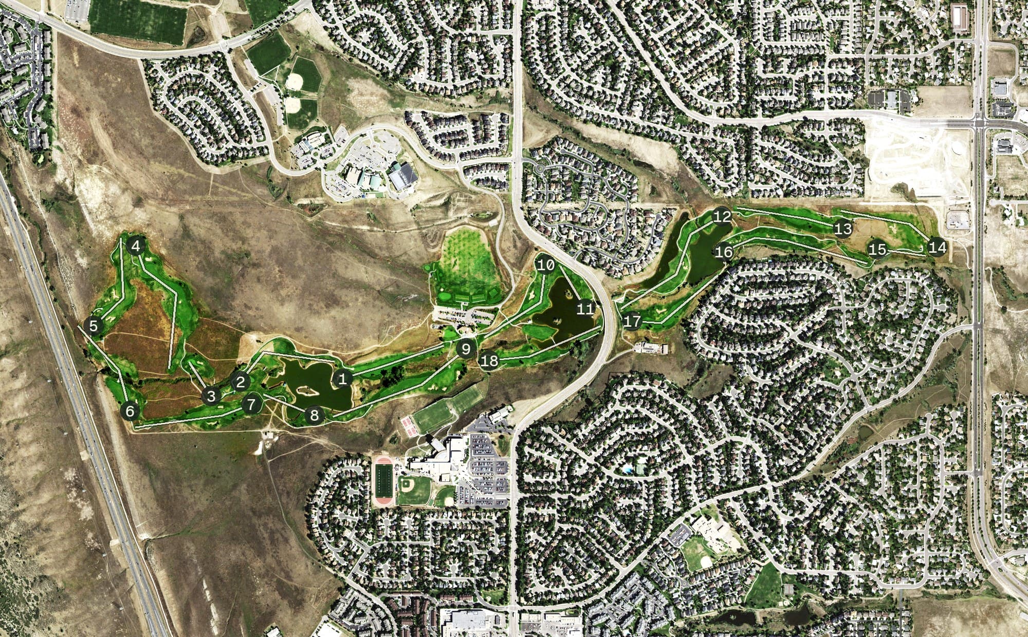 Aerial view of Meadows Golf Course, CO, with its hole routing marked