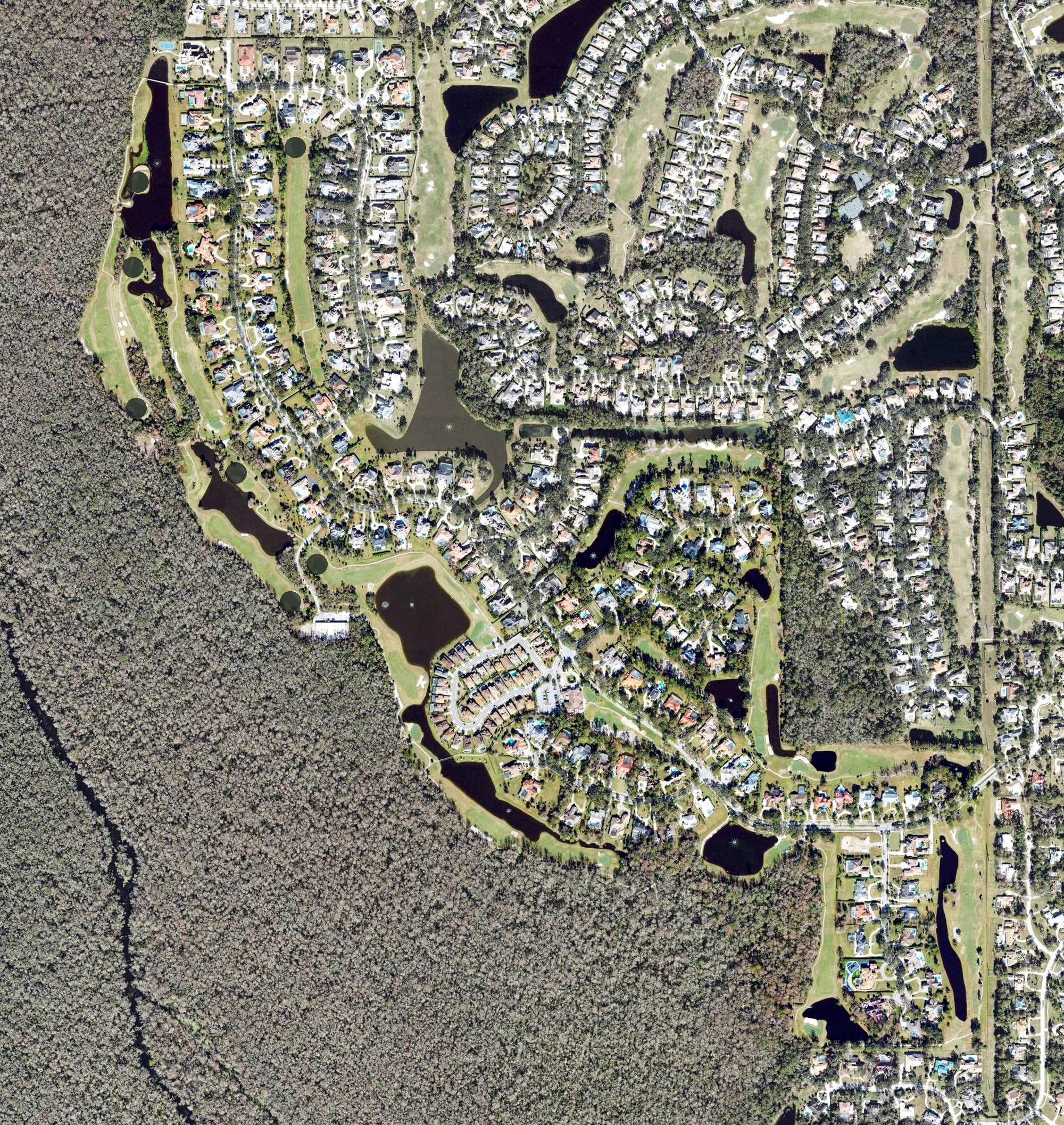 Aerial view of Alaqua Country Club, FL, with its hole routing marked