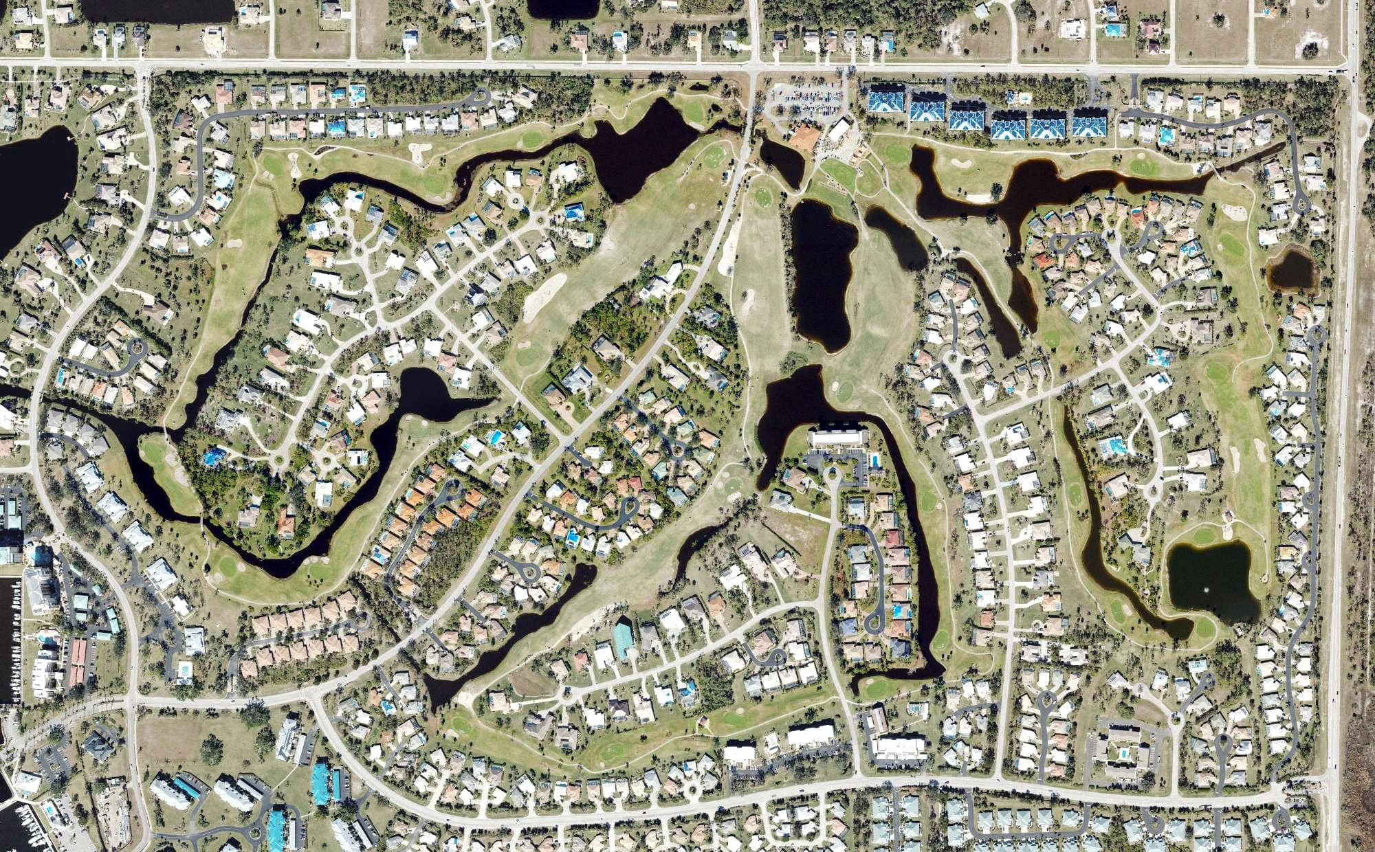Aerial view of Burnt Store Golf Course, FL, with its hole routing marked