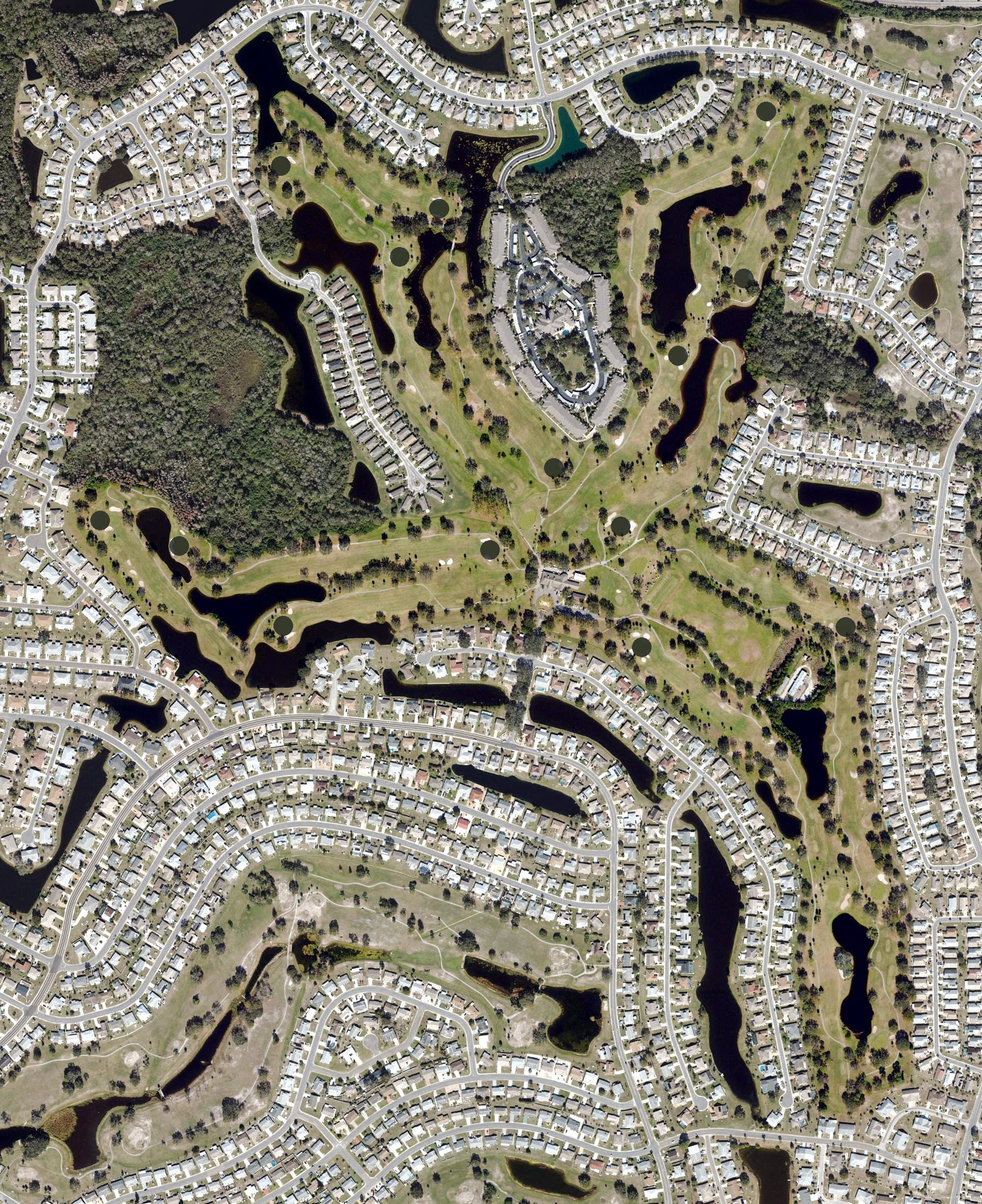 Aerial view of Caloosa Golf & Country Club, FL, with its hole routing marked