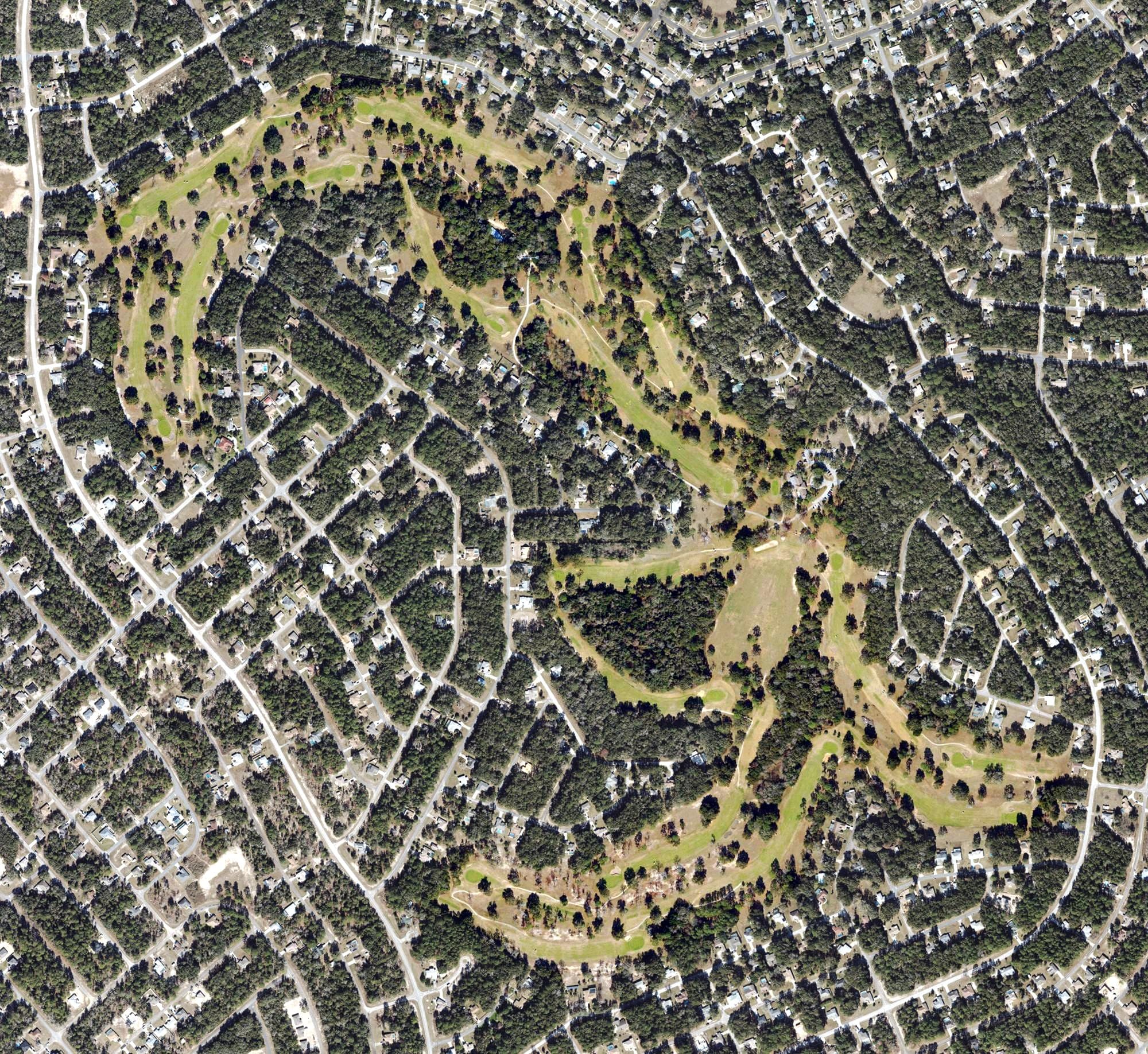 Aerial view of Citrus Springs Golf & Country Club, FL, with its hole routing marked