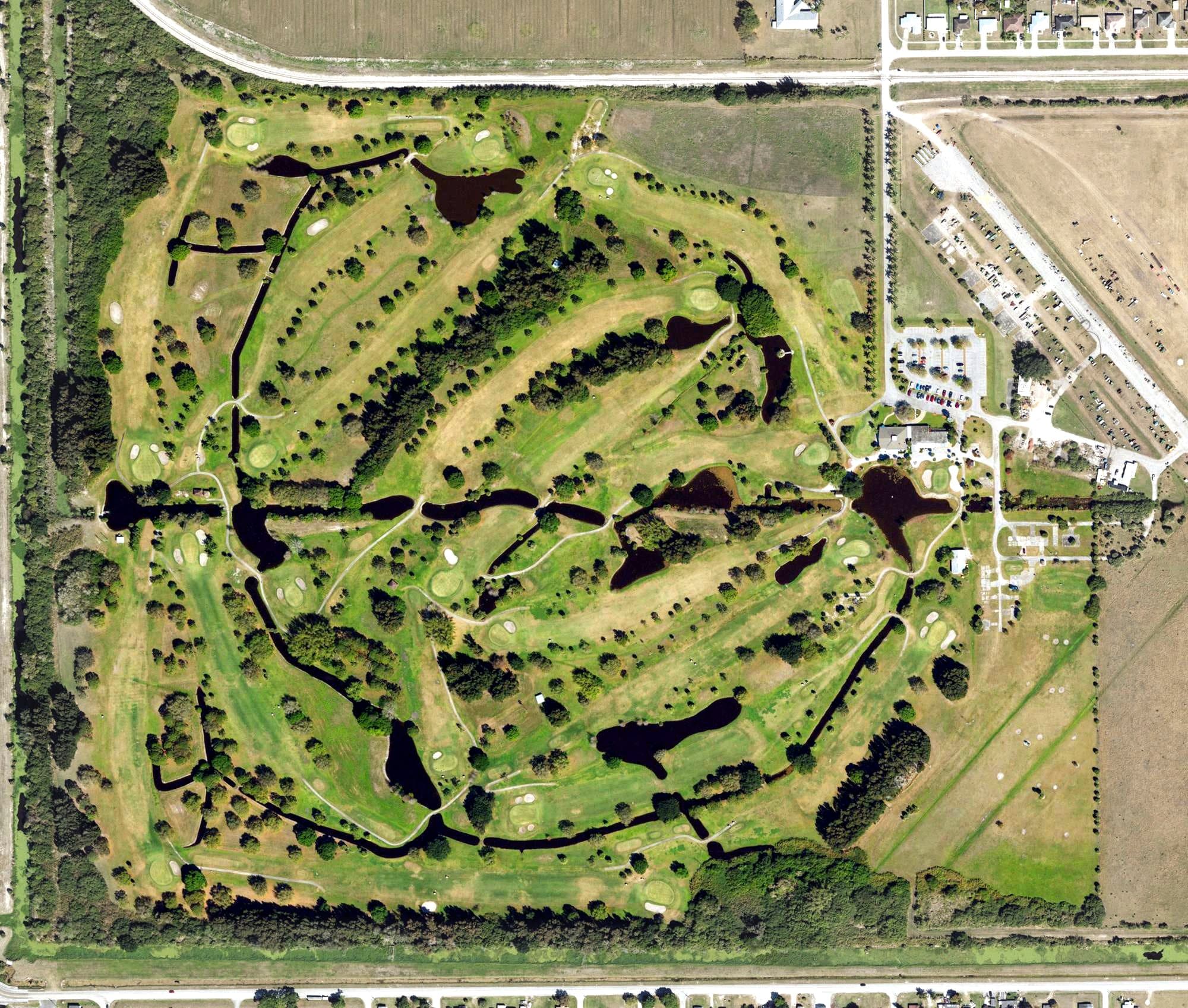 Aerial view of Clewiston Golf Course, FL, with its hole routing marked