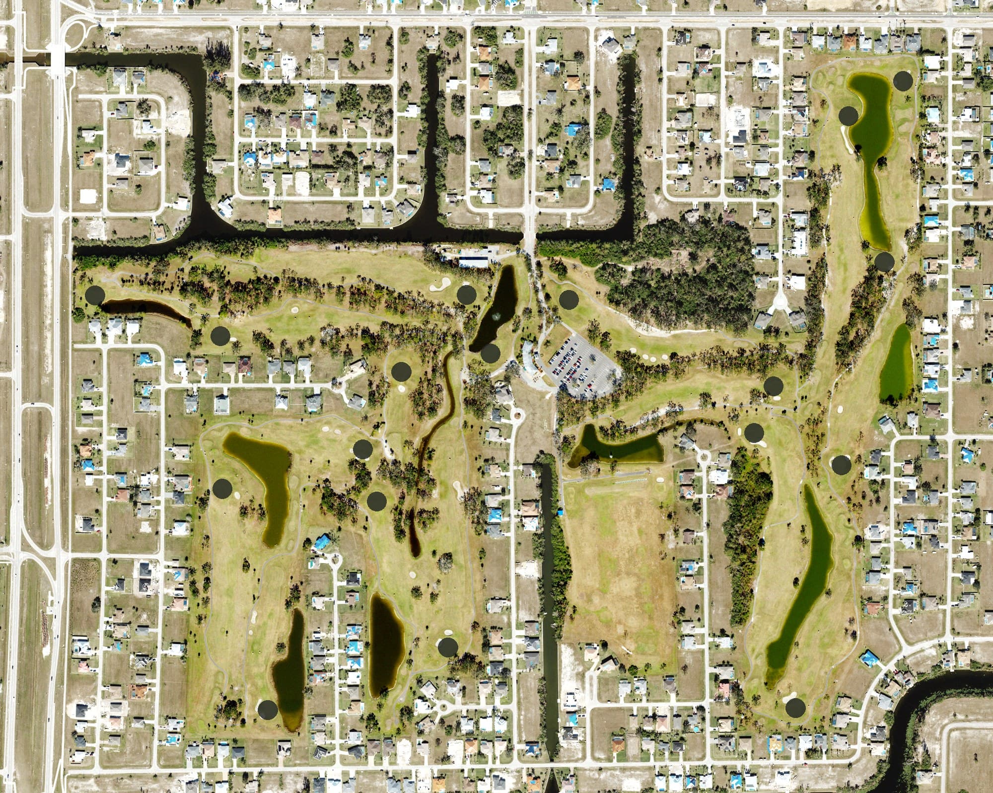 Aerial view of Coral Oaks Golf Course, FL, with its hole routing marked