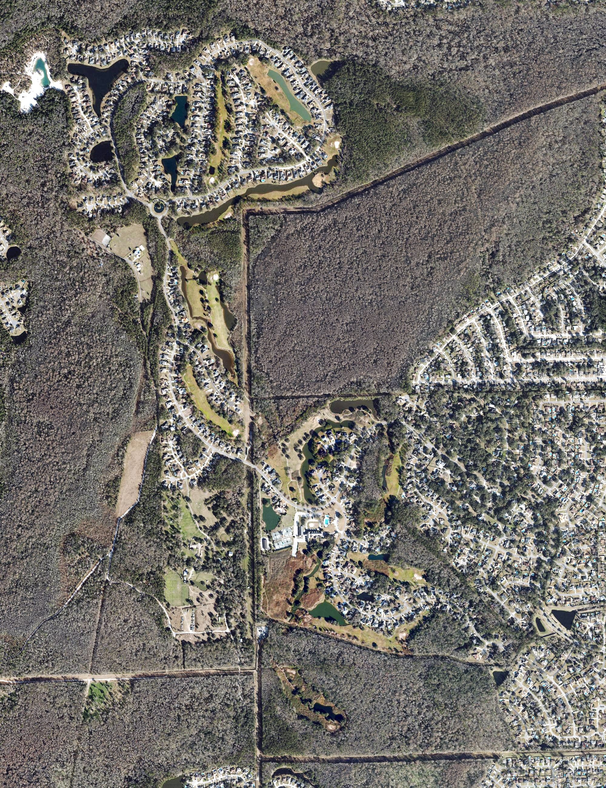 Aerial view of Country Club of Orange Park, FL, with its hole routing marked